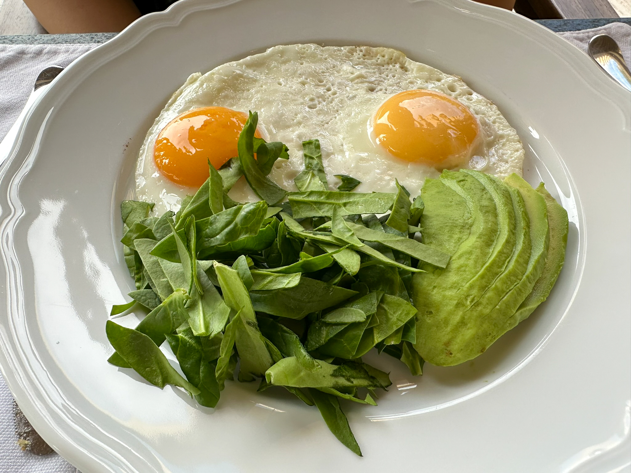Four Seasons Tamarindo Coyul fried eggs with avocado and spinach Four Seasons Tamarindo Coyul fried eggs with avocado and spinach