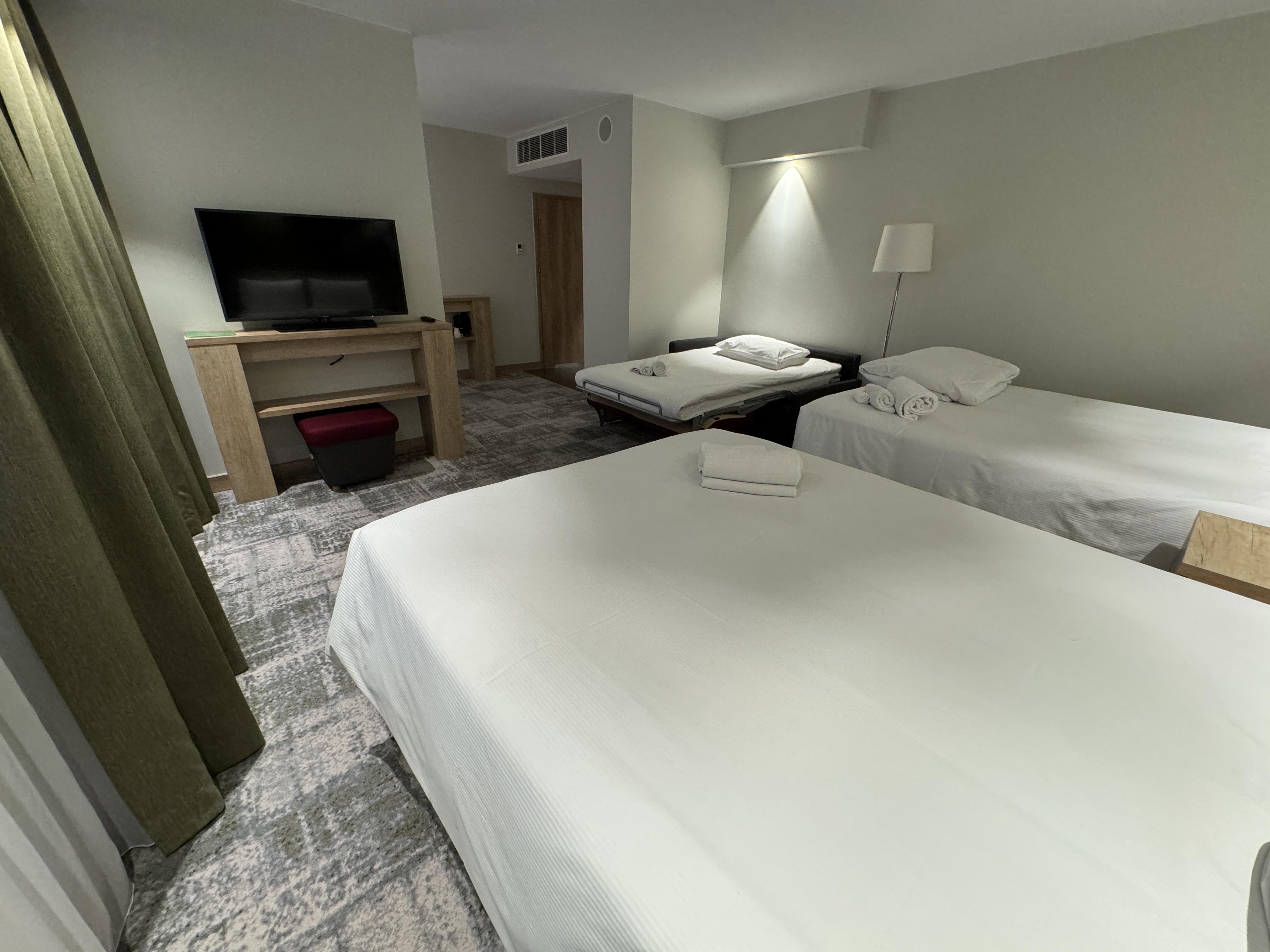 Hampton by Hilton Gdansk Old Town beds from rear Hampton by Hilton Gdansk Old Town TV