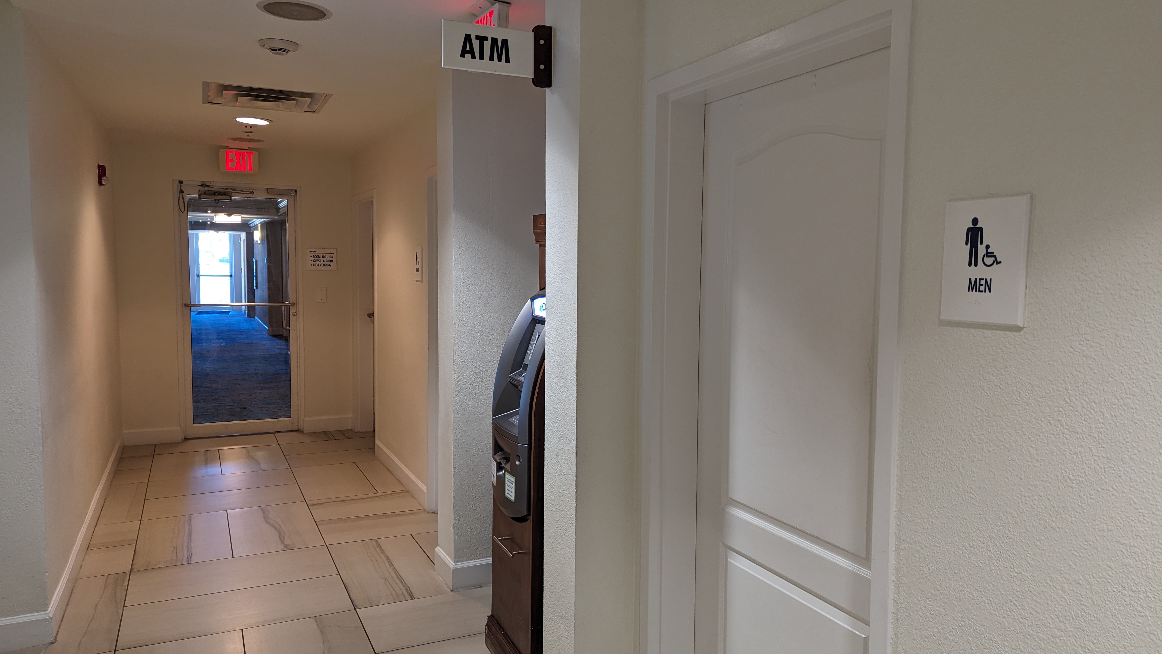 Hilton Pensacola Beach amenities hallway ATM and restrooms