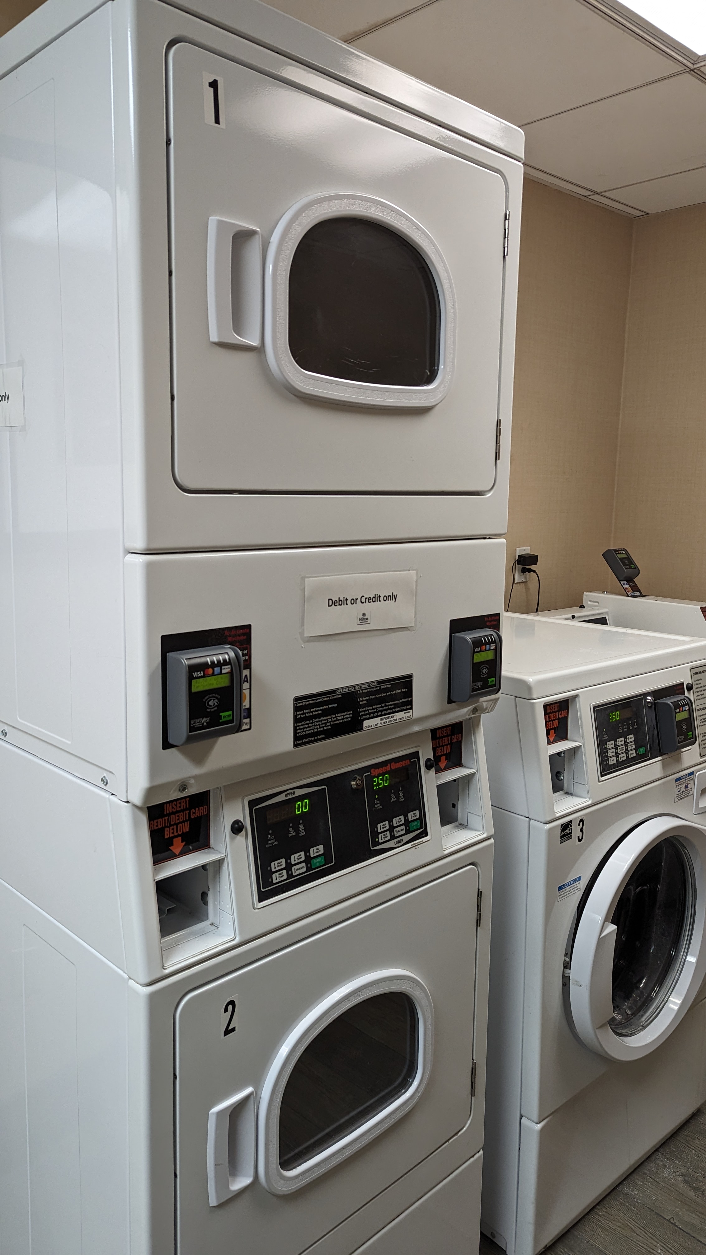 Hilton Pensacola Beach amenities laundry room machines stacked