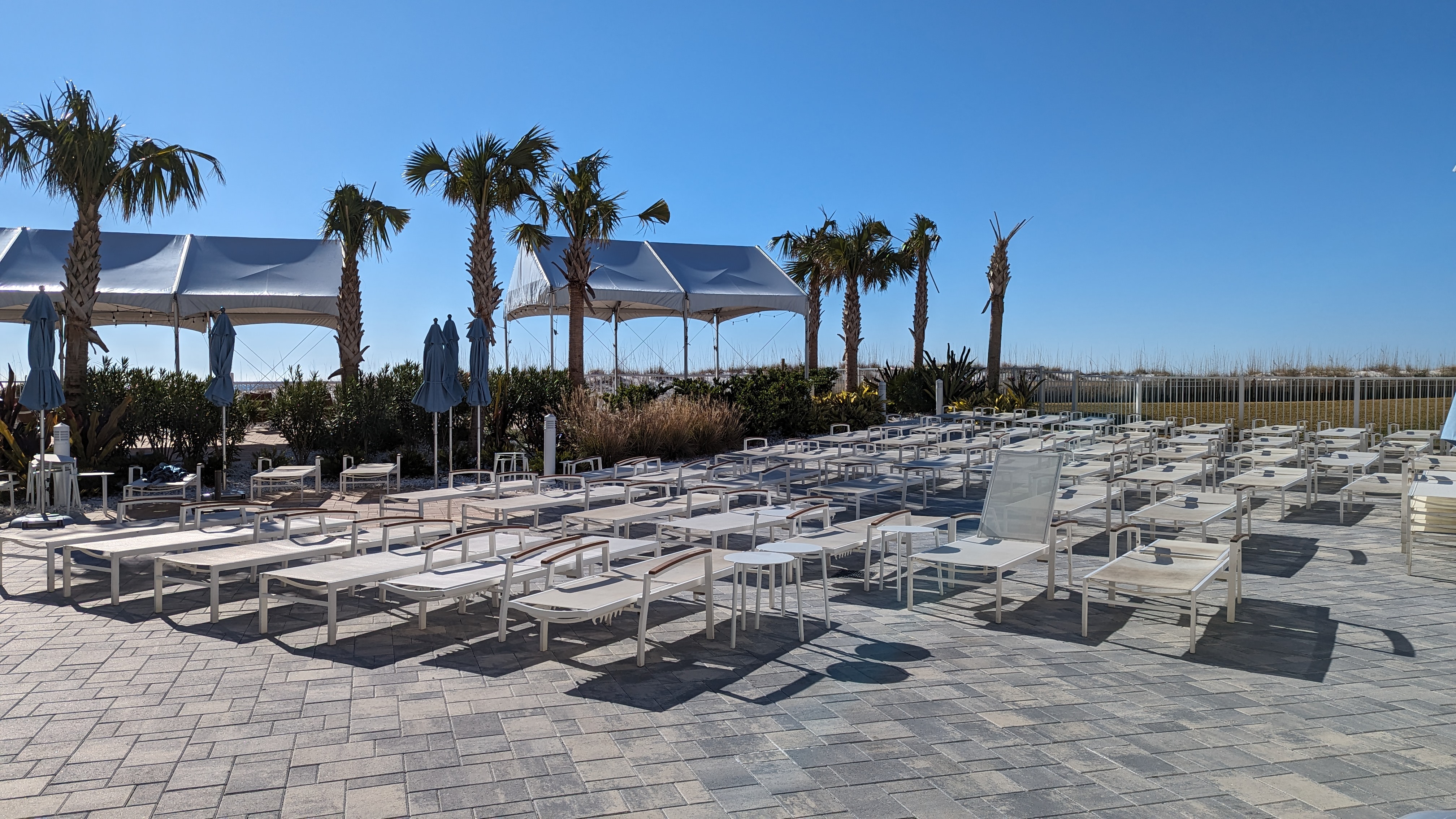 Hilton Pensacola Beach amenities pool loungers