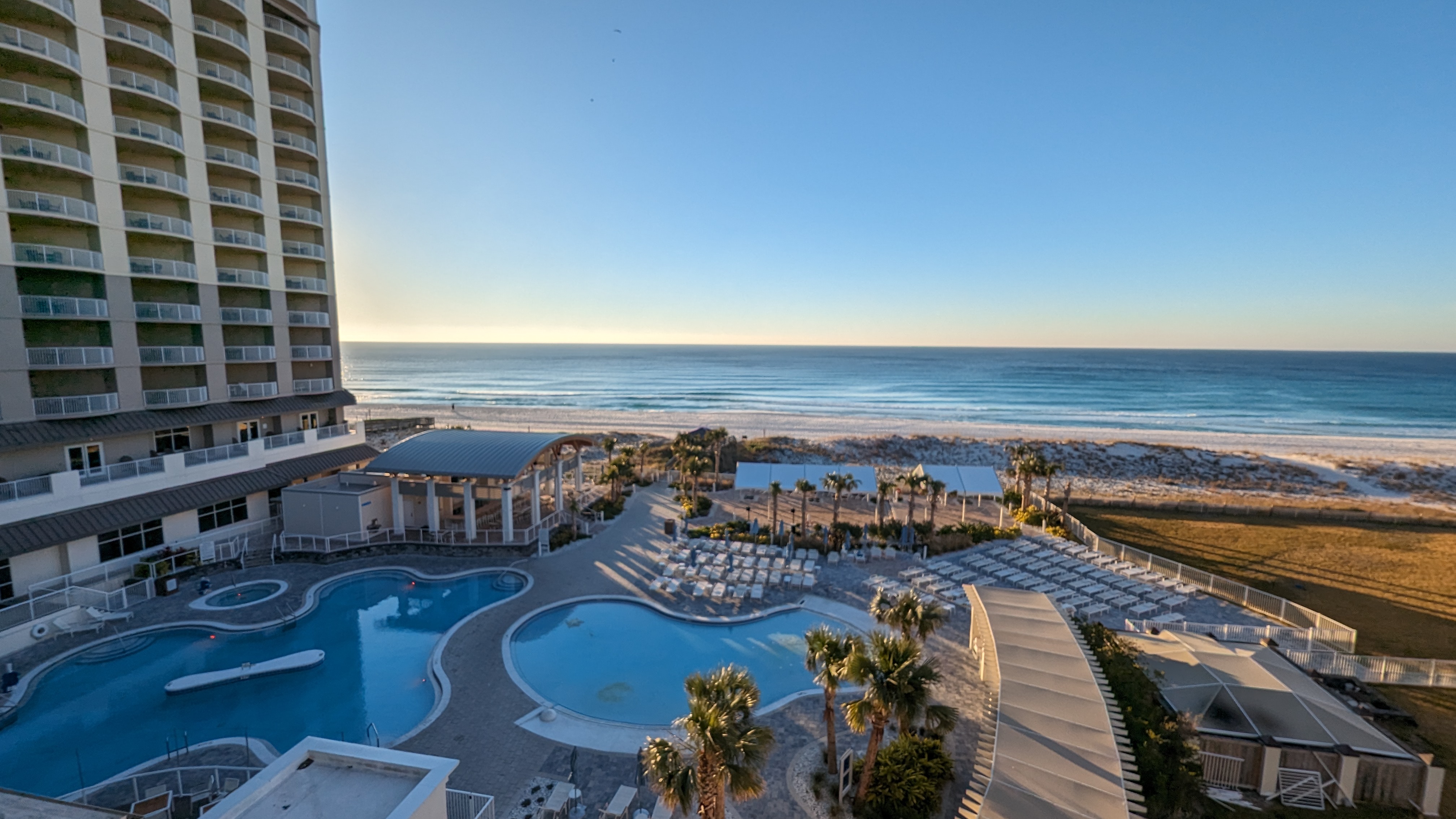 Hilton Pensacola Beach guestroom pool and beach view Hilton Pensacola Beach guestroom pool and beach view