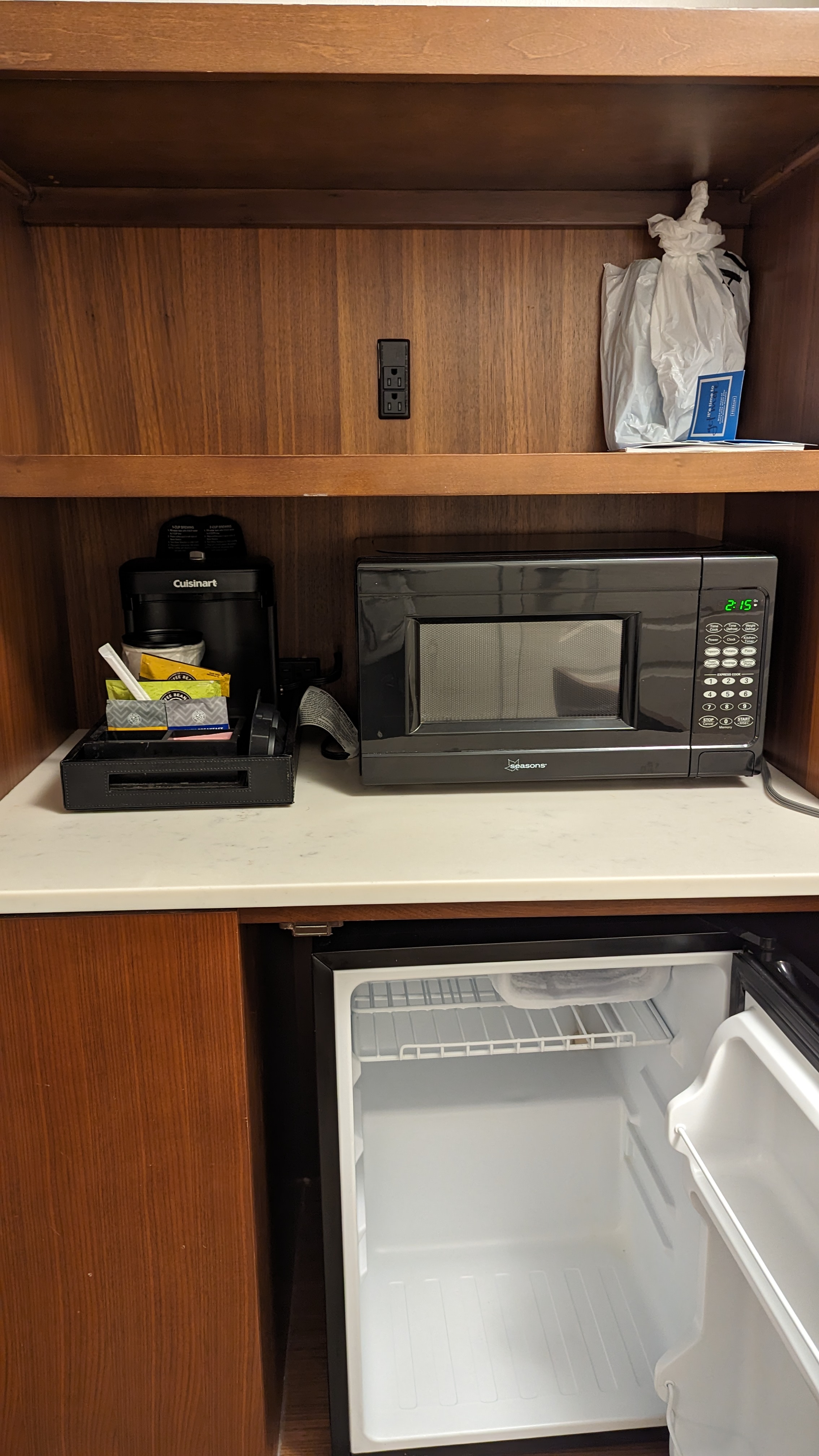 Hilton Pensacola Beach guestroom refrigerator and coffee maker