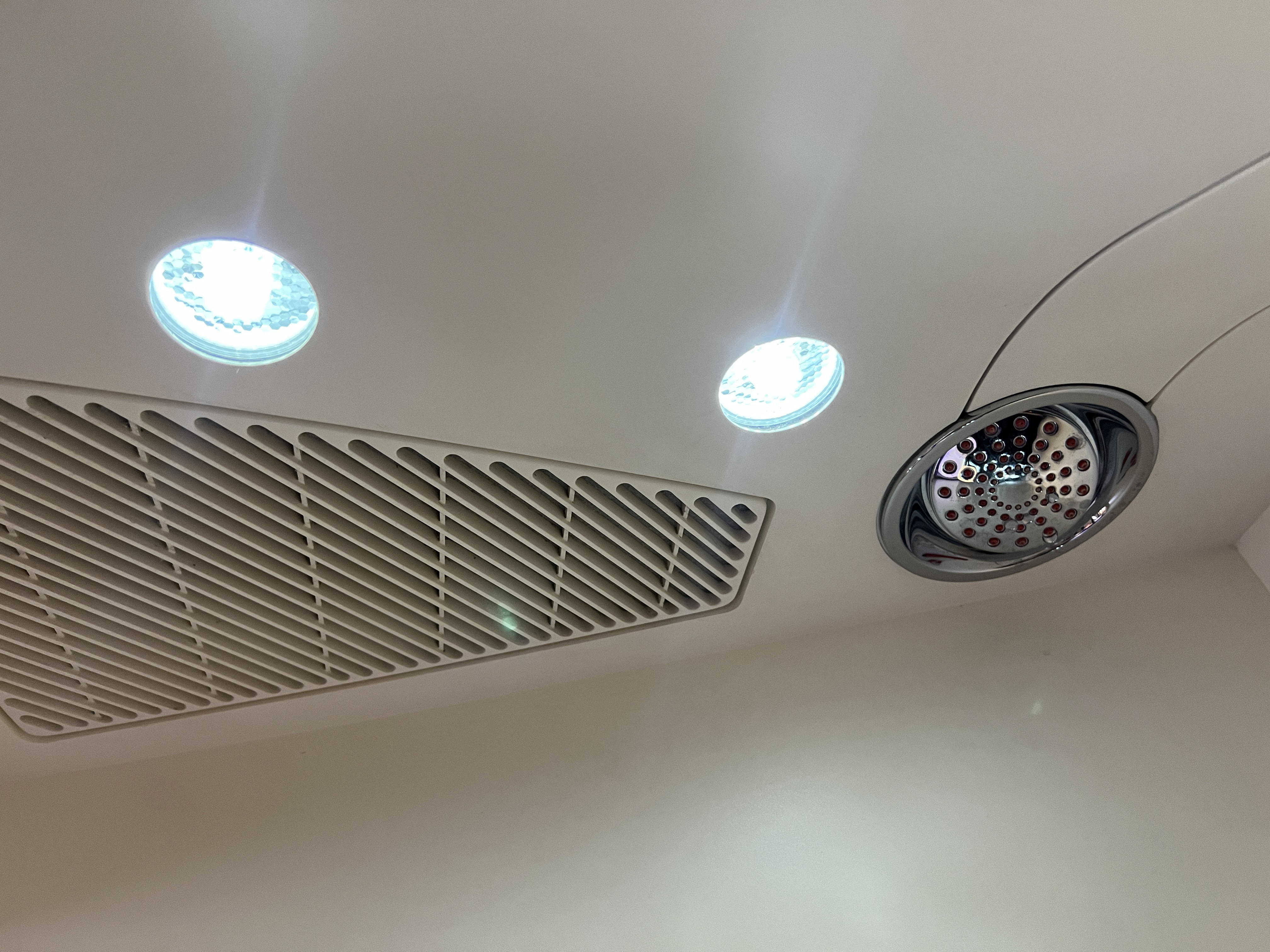 Etihad First Class Apartment shower head and lights Etihad First Class Apartment shower head and lights