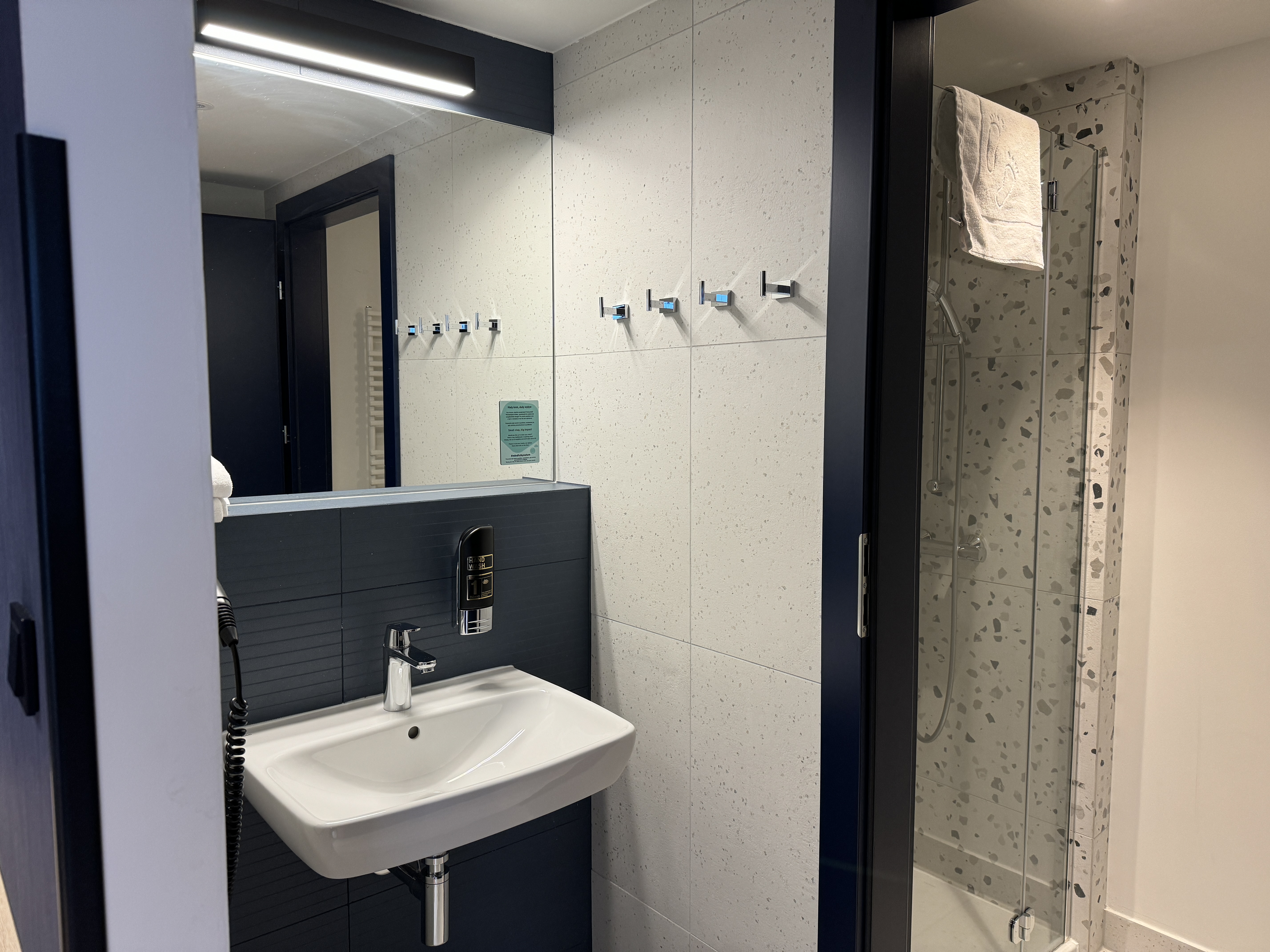 MEININGER Krakow Centrum family room bathroom sink shower MEININGER Krakow Centrum family room bathroom sink shower