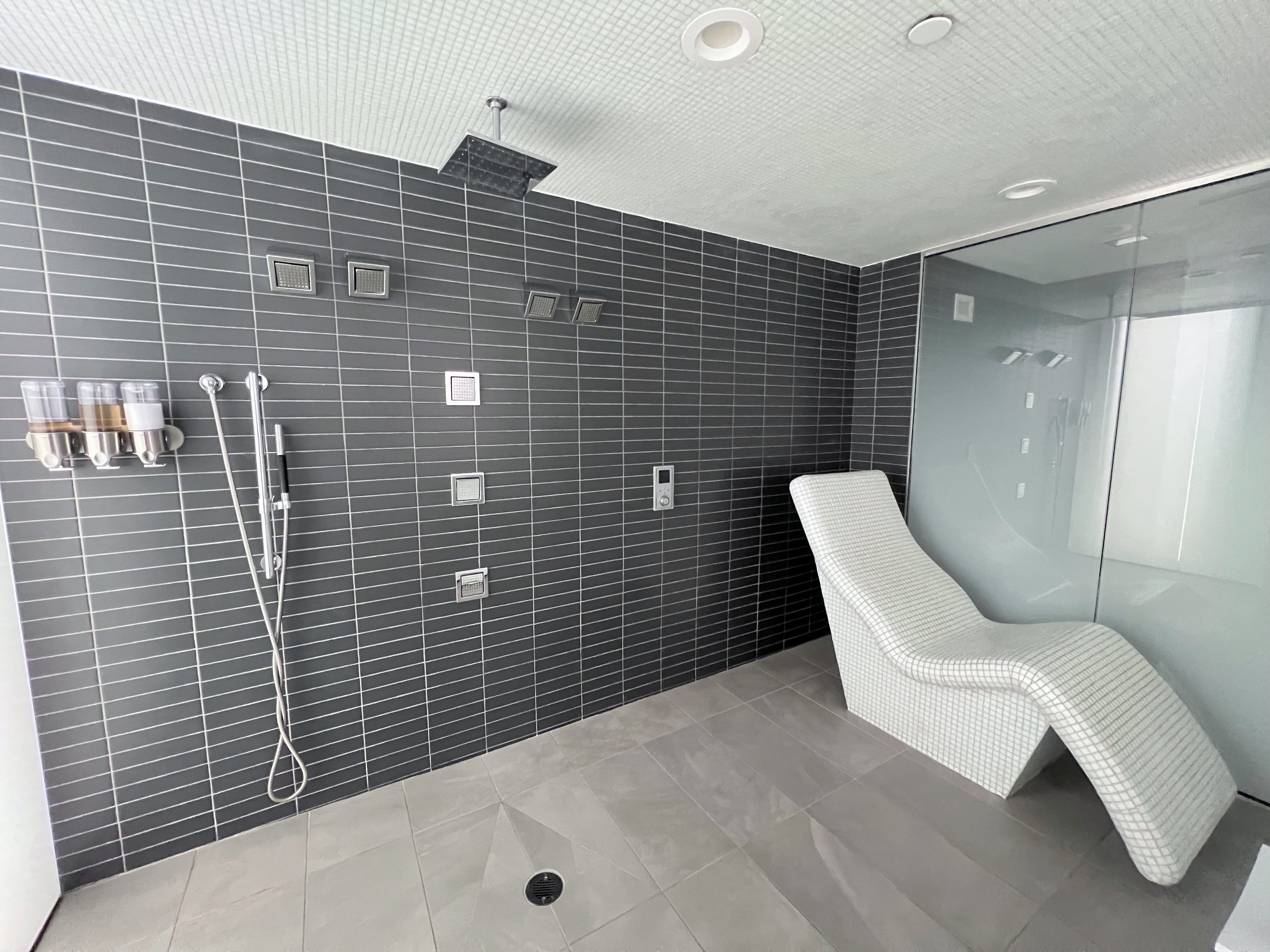 Spa suite shower and chaise lounge at Le Meridien Columbus The Joseph