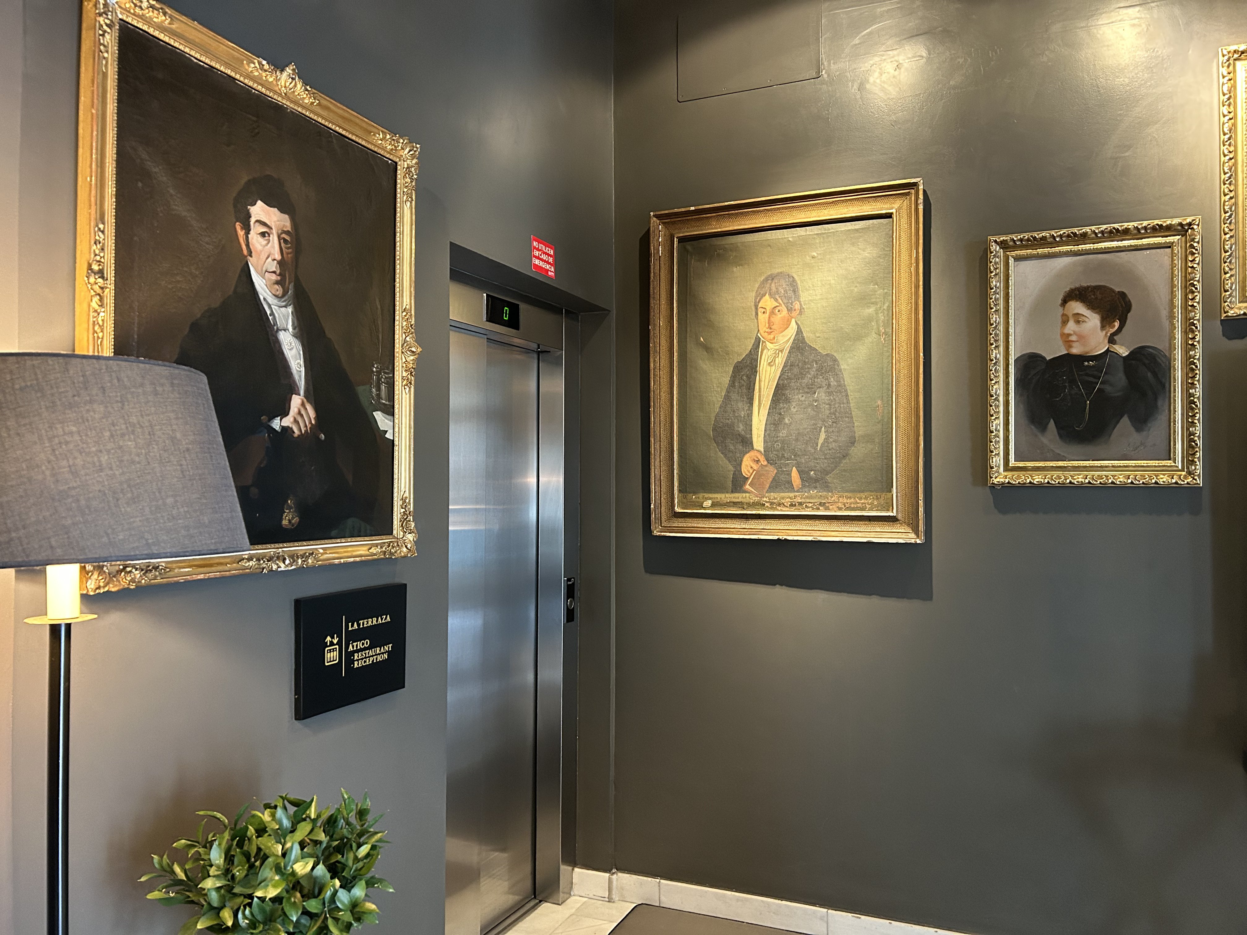 The Principal Madrid Hotel elevator and portraits The Principal Madrid Hotel elevator and portraits