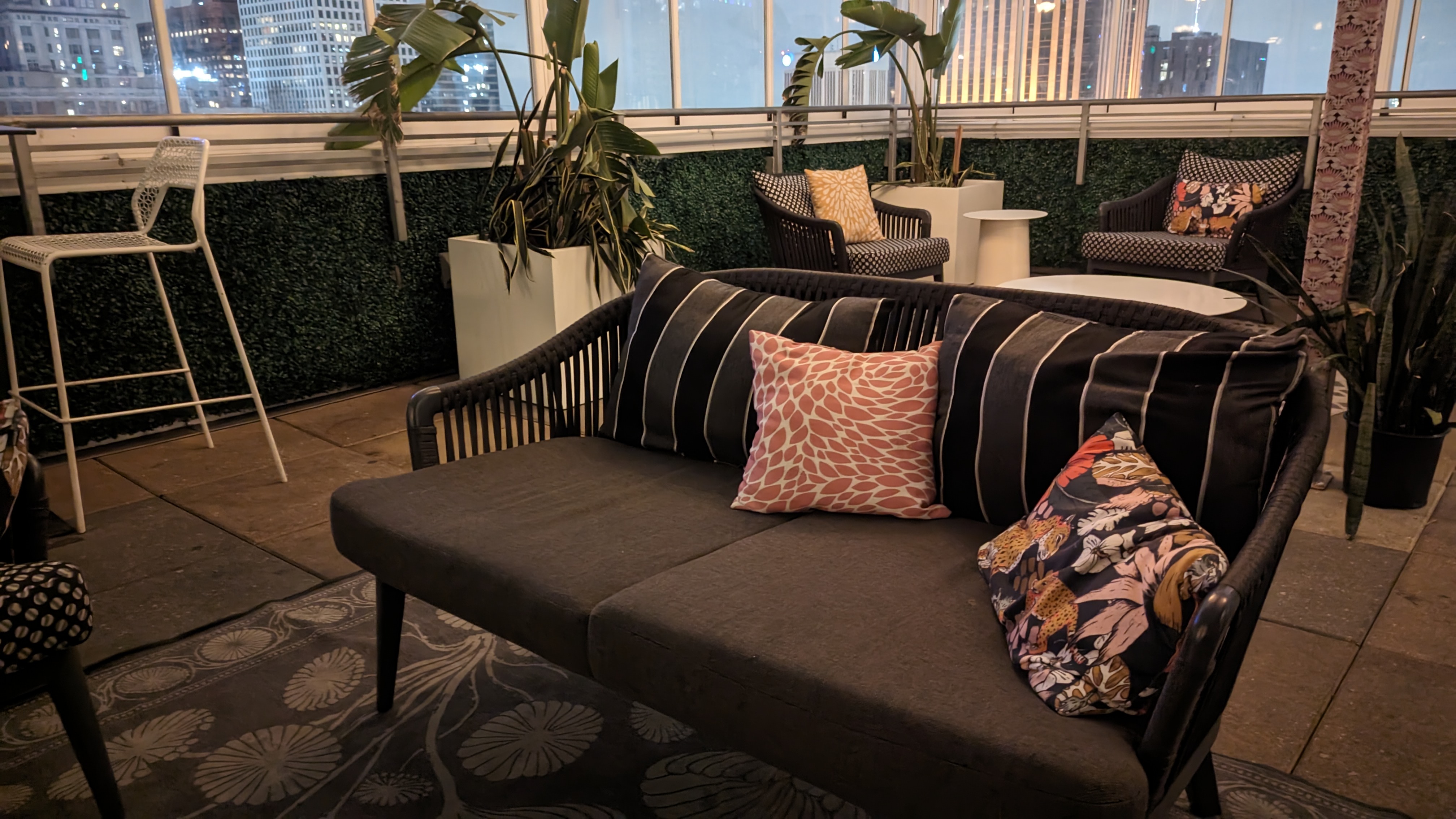 The Troubadour Hotel New Orleans food and beverage Ingenue rooftop bar loveseat