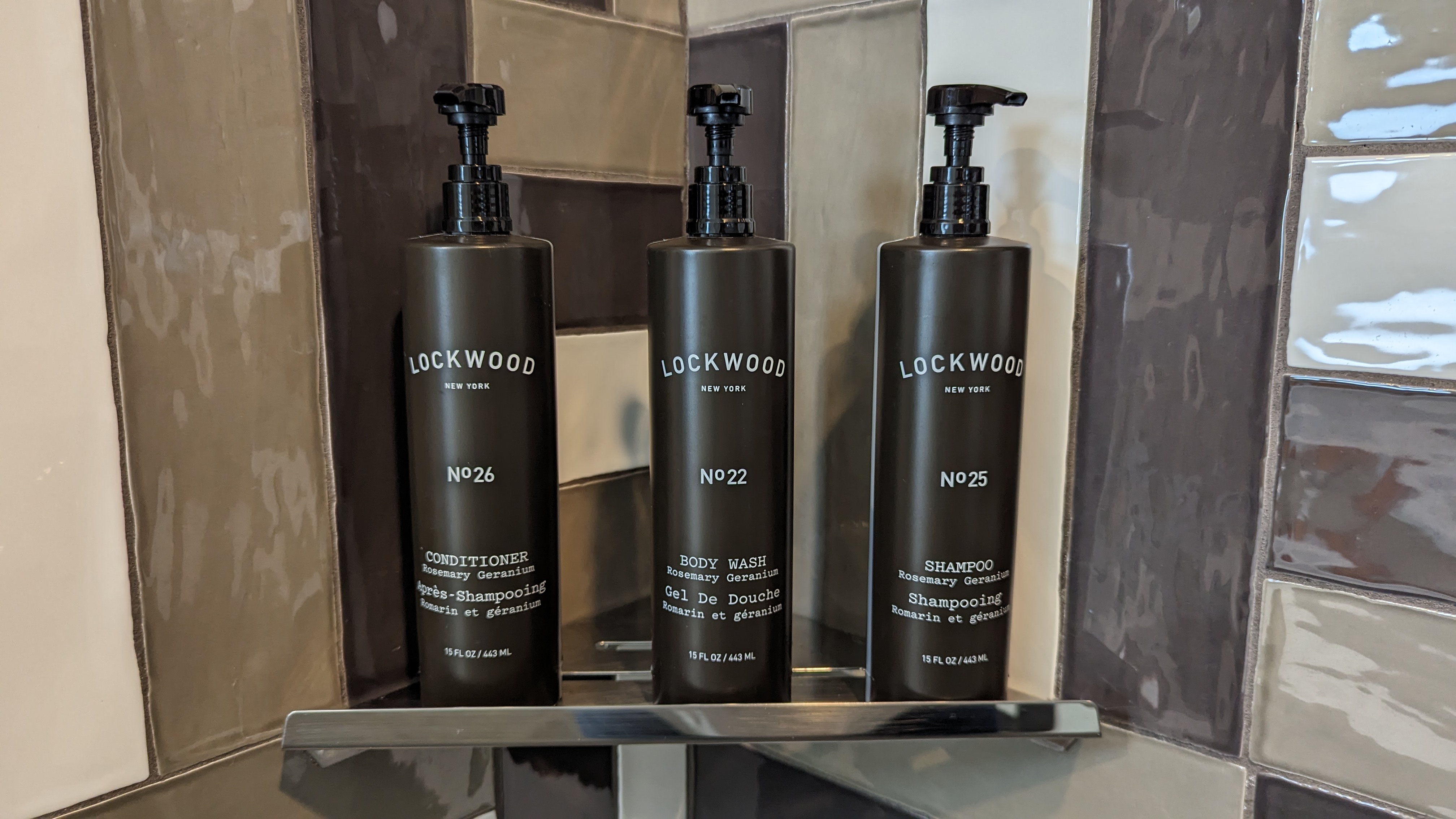 The Troubadour Hotel New Orleans guestroom bathroom shower amenities 