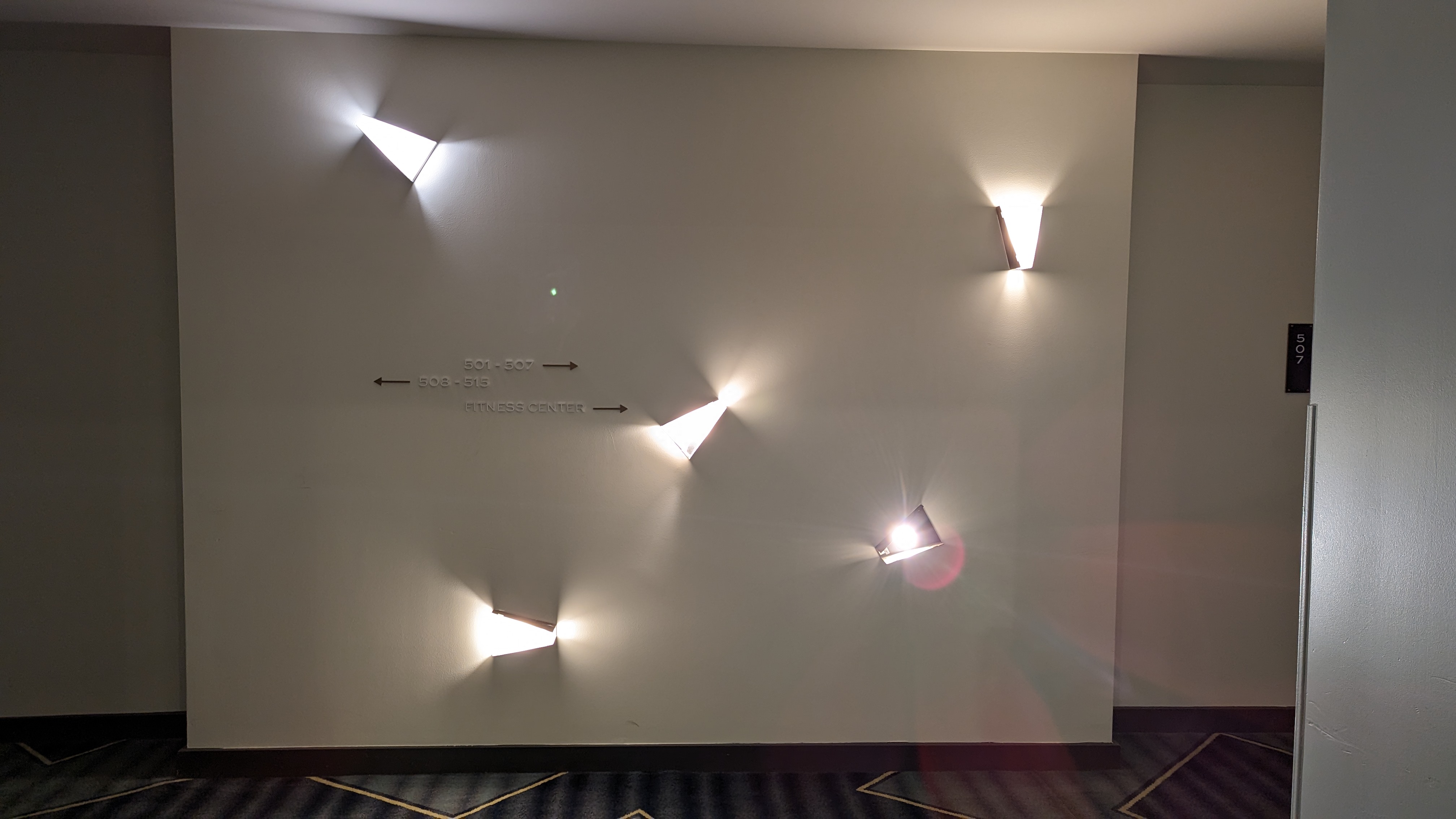 The Troubadour Hotel New Orleans guestroom hallway lights