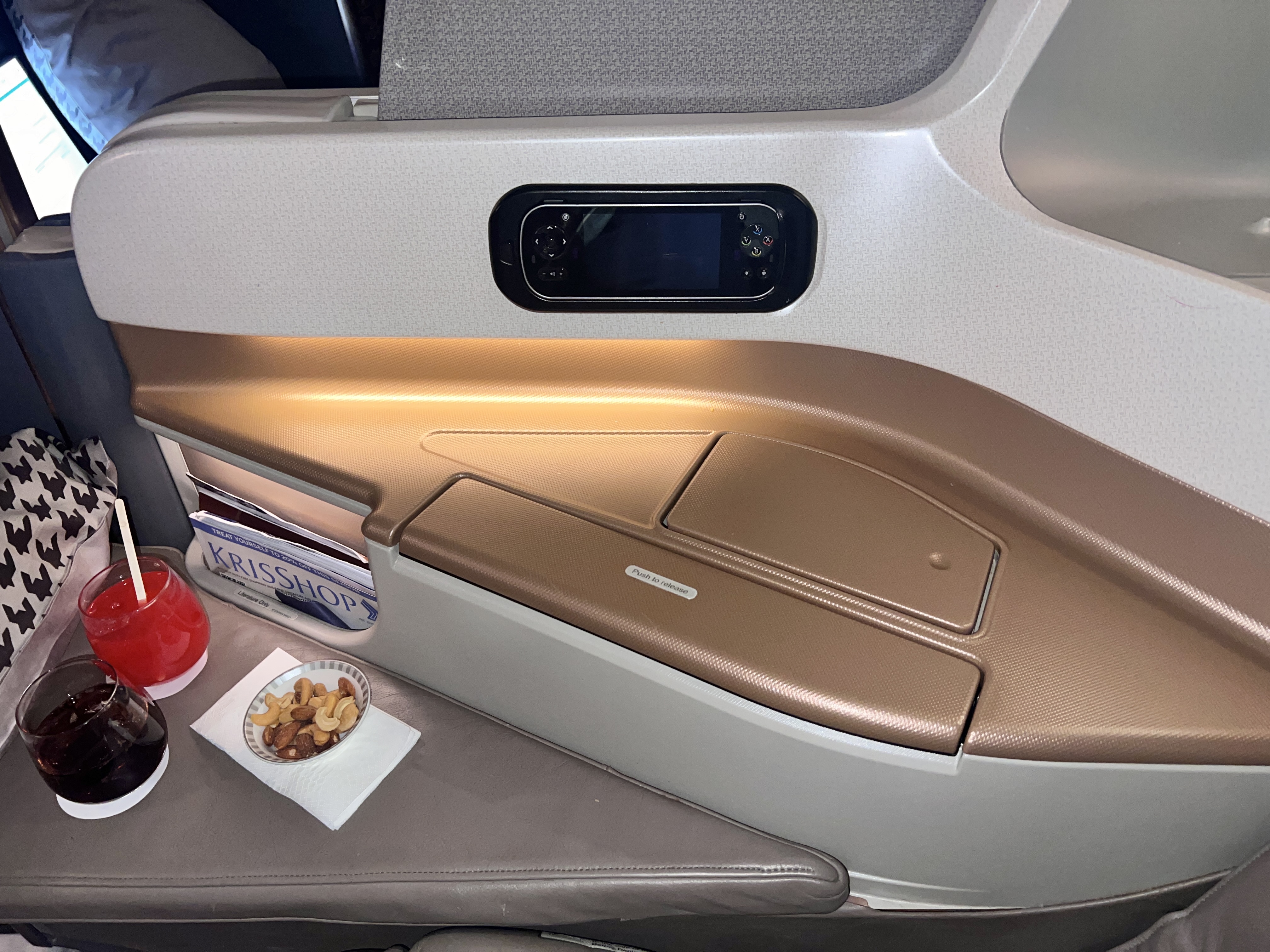 Singapore business 777 armrest and storage area Singapore business 777 armrest and storage area