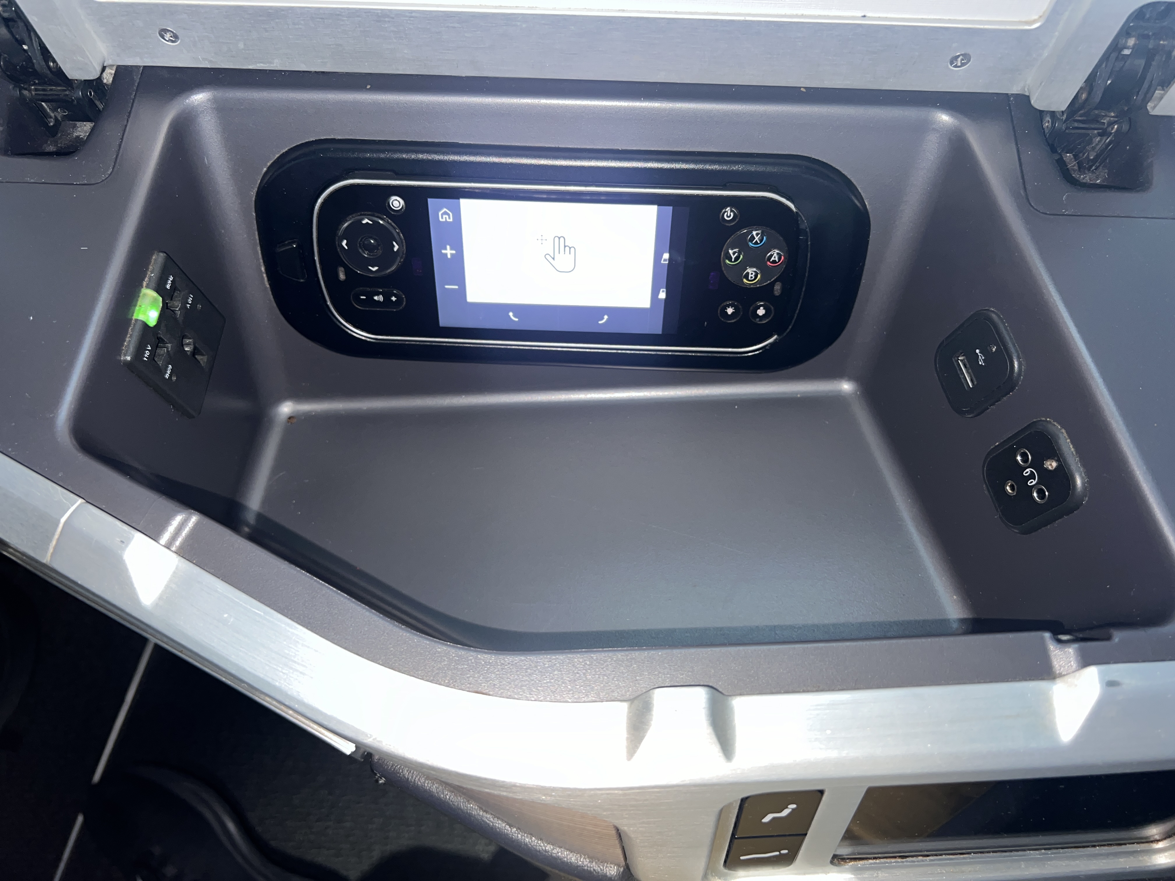 Air Canada business class storage cubby and IFE remote Air Canada business class storage cubby and IFE remote