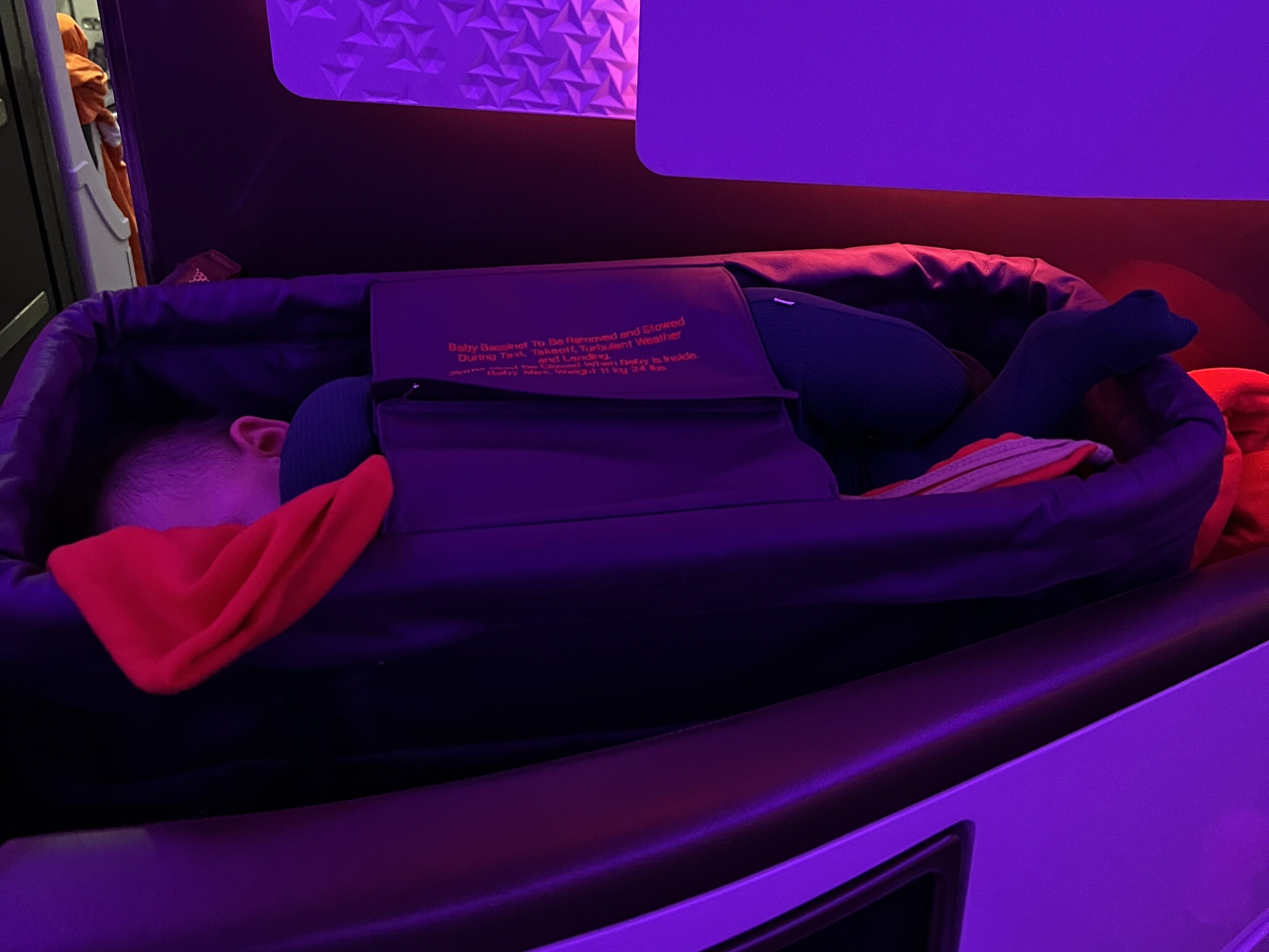 Baby Flying in Bassinet Virgin Atlantic Upper Class Baby Flying in Bassinet Virgin Atlantic Upper Class