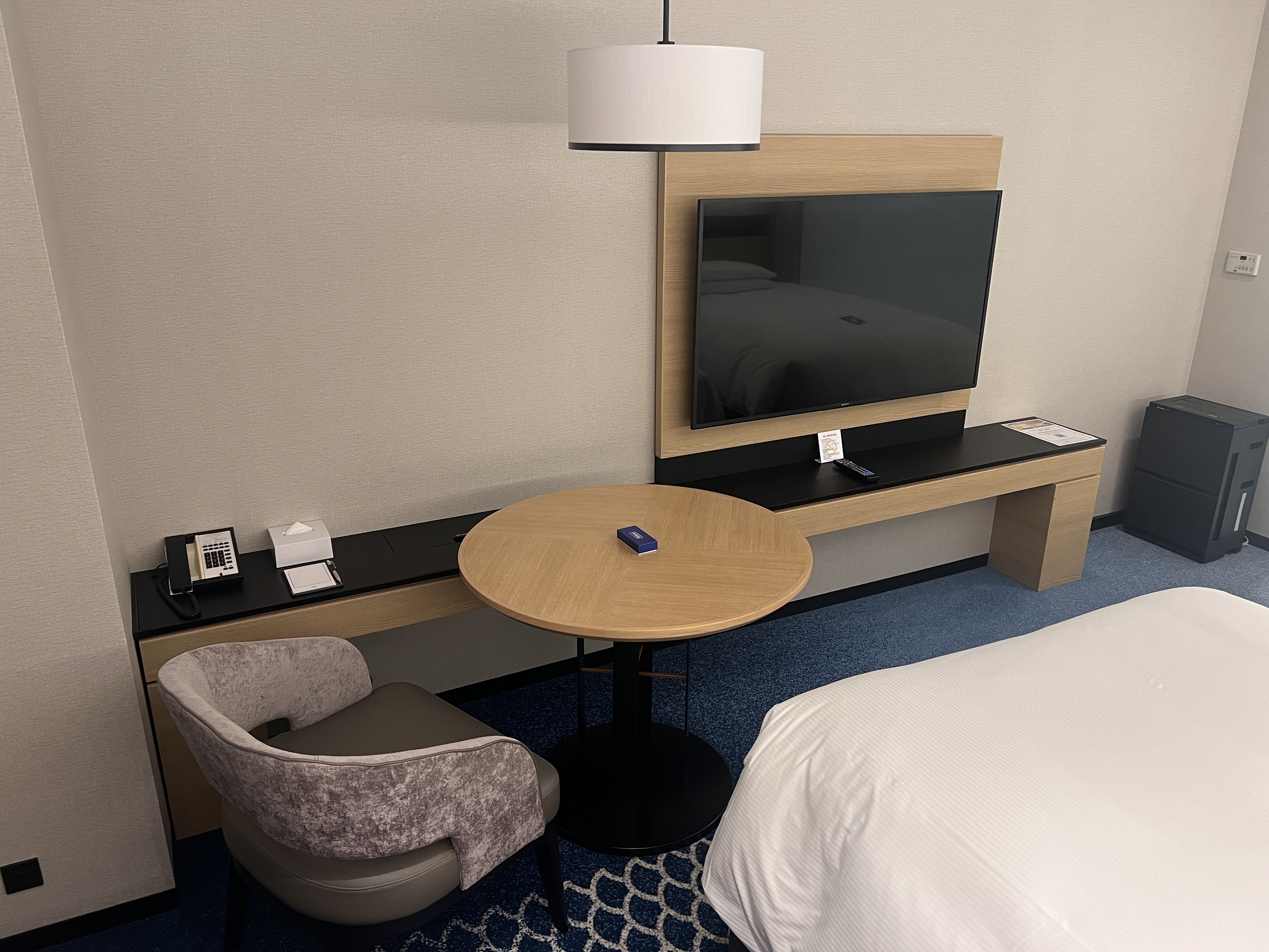Hilton Tokyo Bay room dining table and mounted TV Hilton Tokyo Bay room dining table and mounted TV