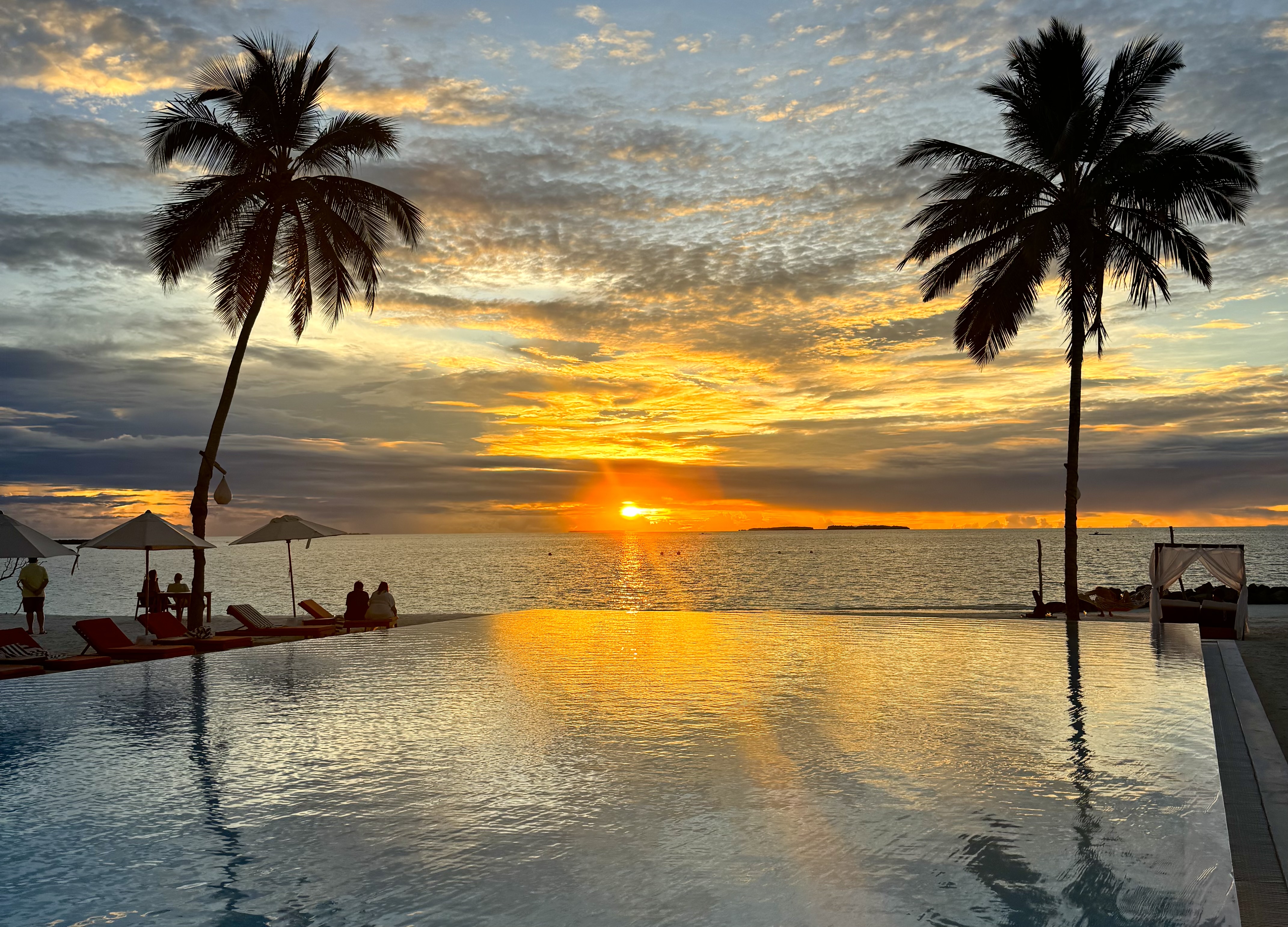 Iru Veli island pool sunset 
