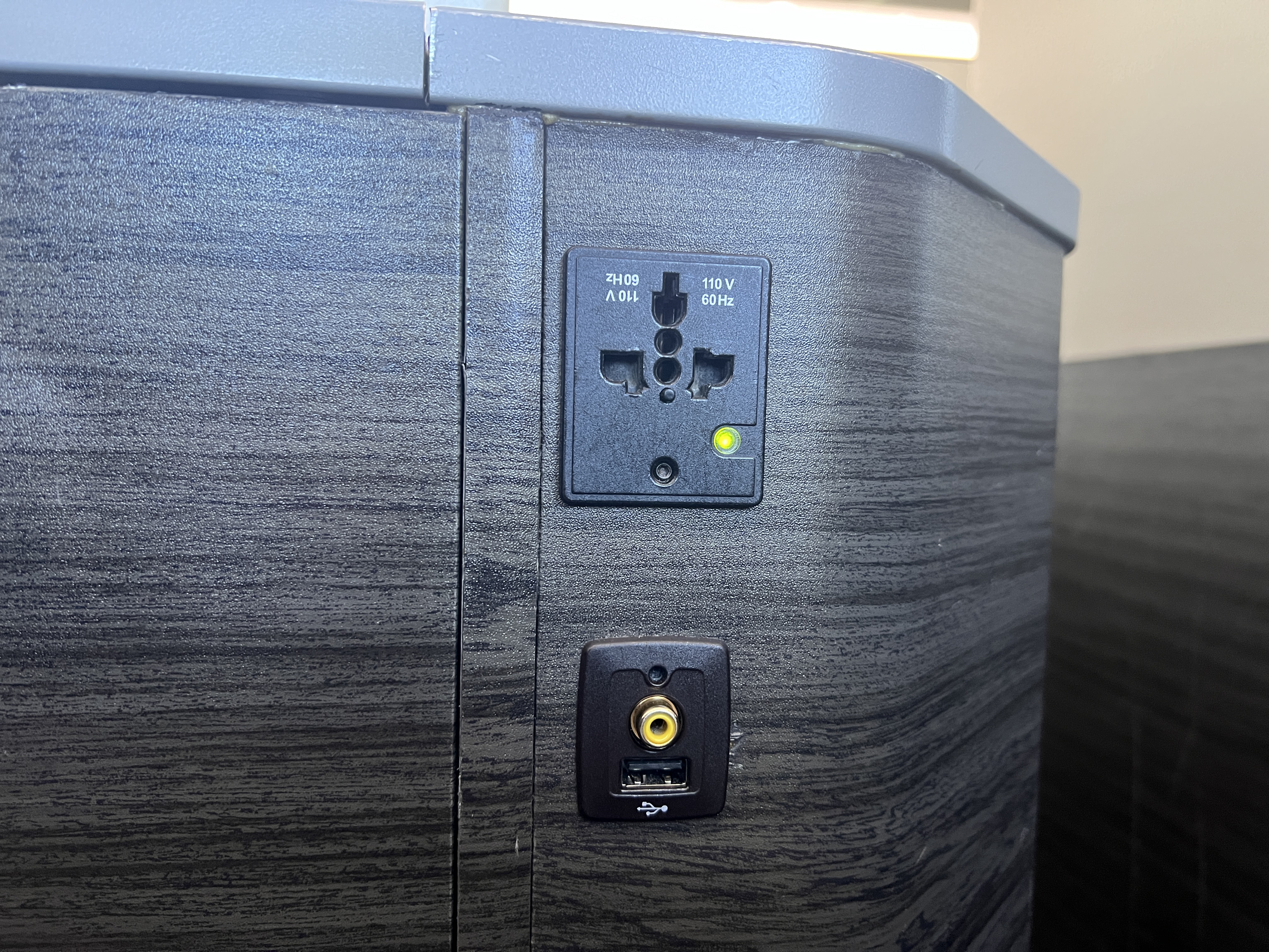 Japan Airlines 777 300er business class AC power outlet Japan Airlines 777 300er business class AC power outlet