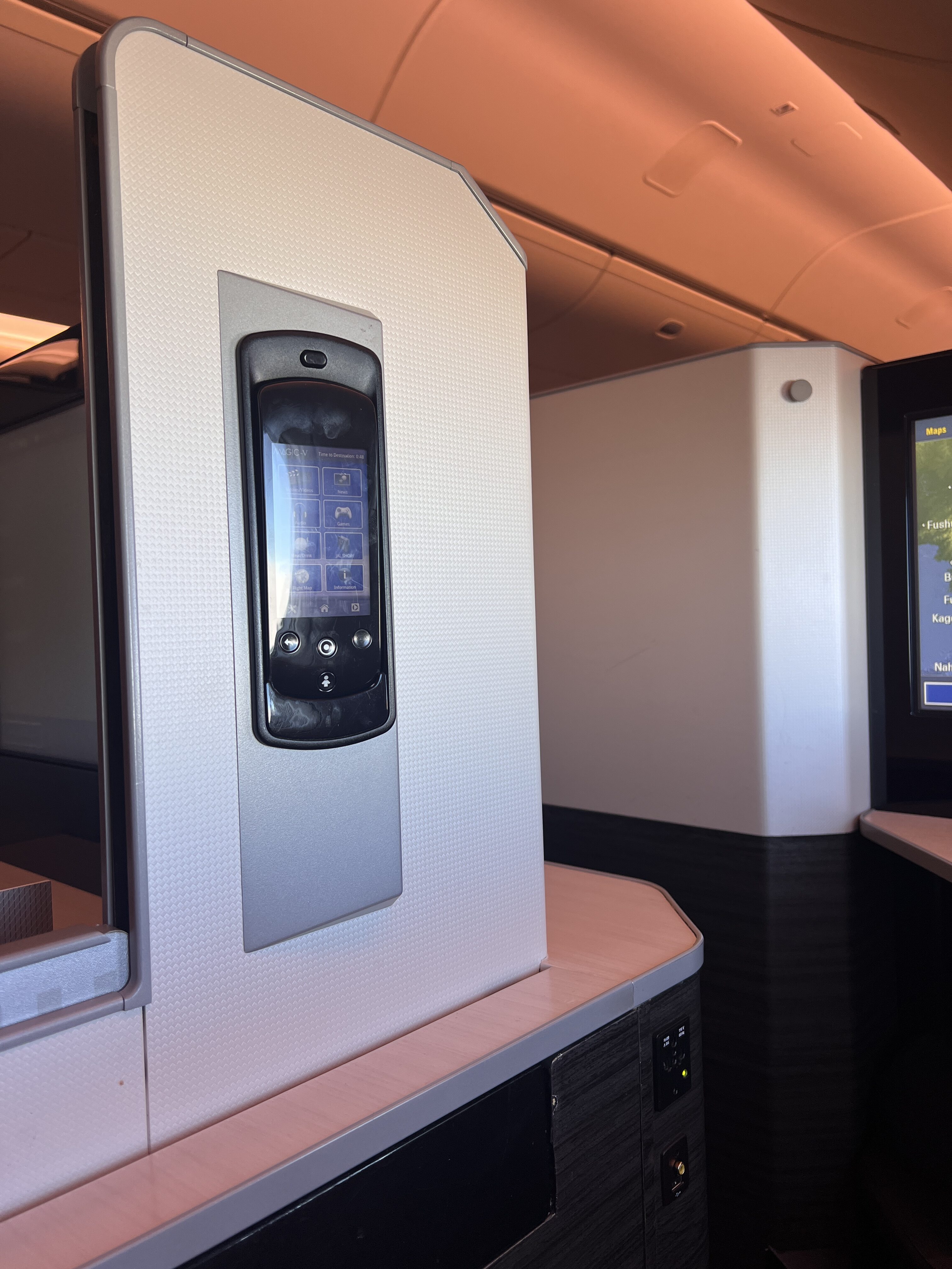 Japan Airlines 777 300er business class IFE controller spot Japan Airlines 777 300er business class IFE controller spot