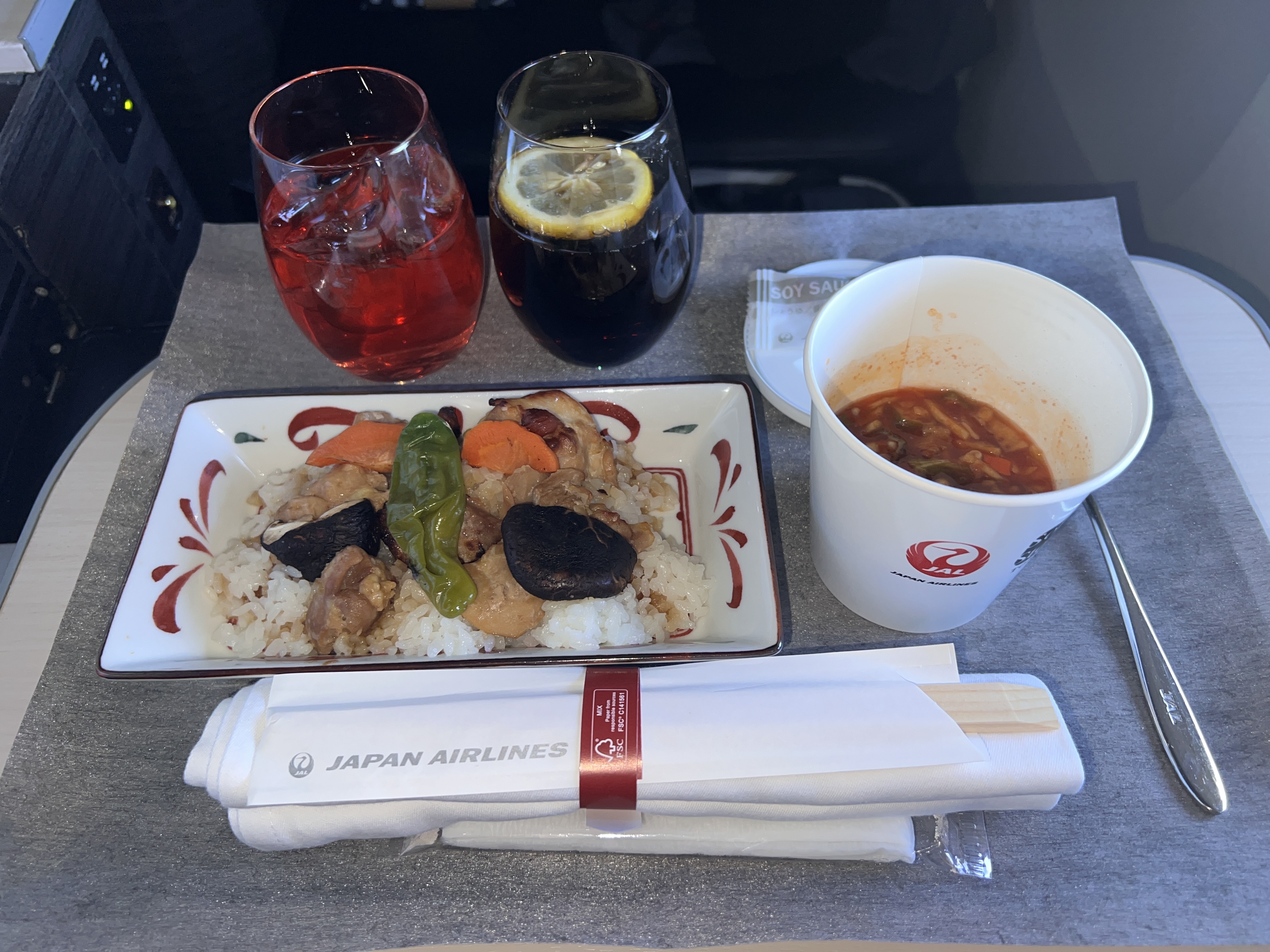 Japan Airlines 777 300er business class chicken and vegetbale teriyaki rice bowl Japan Airlines 777 300er business class chicken and vegetbale teriyaki rice bowl