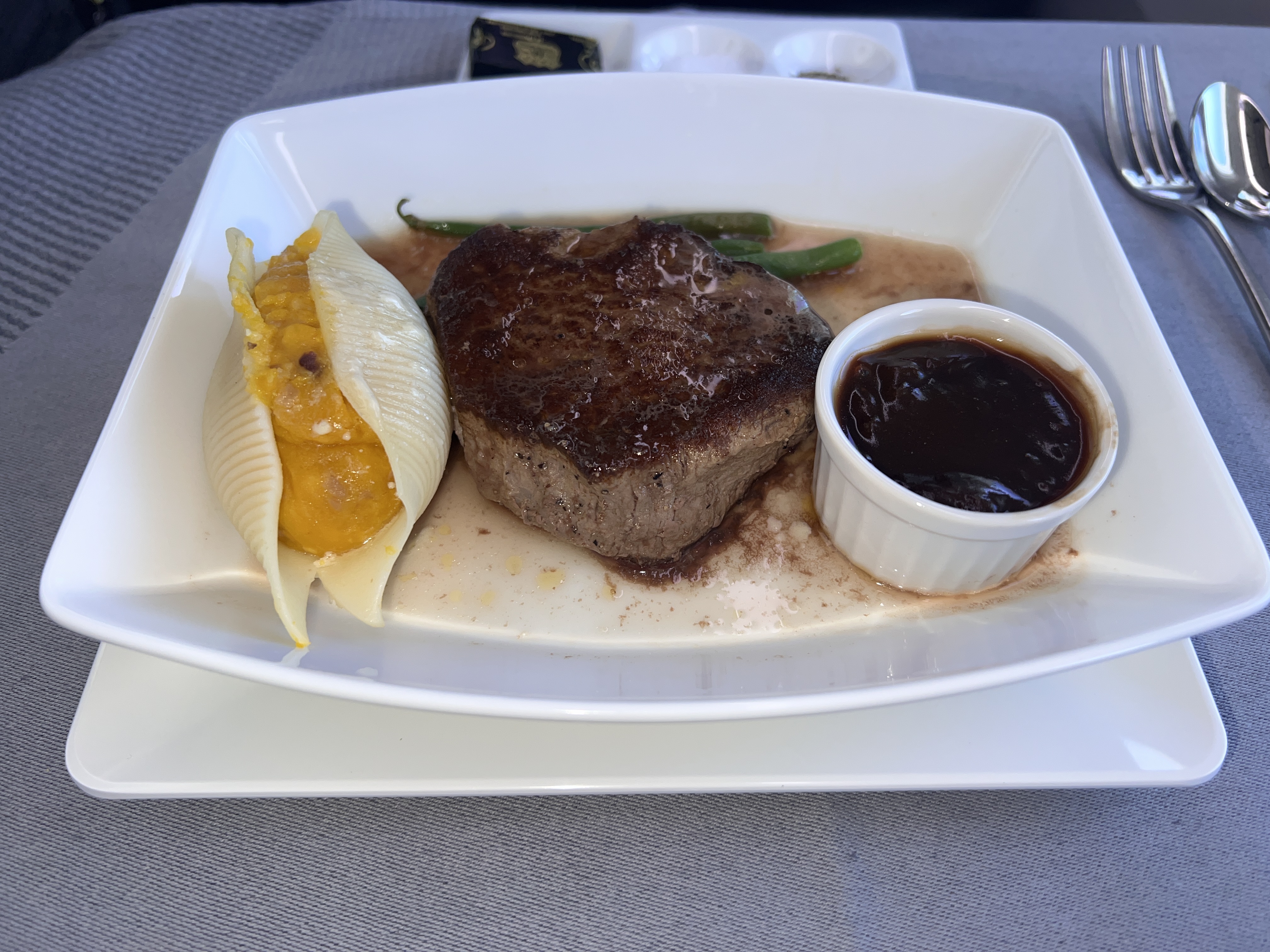 Japan Airlines 777 300er business class international main course prime beef tenderloin Japan Airlines 777 300er business class international main course prime beef tenderloin