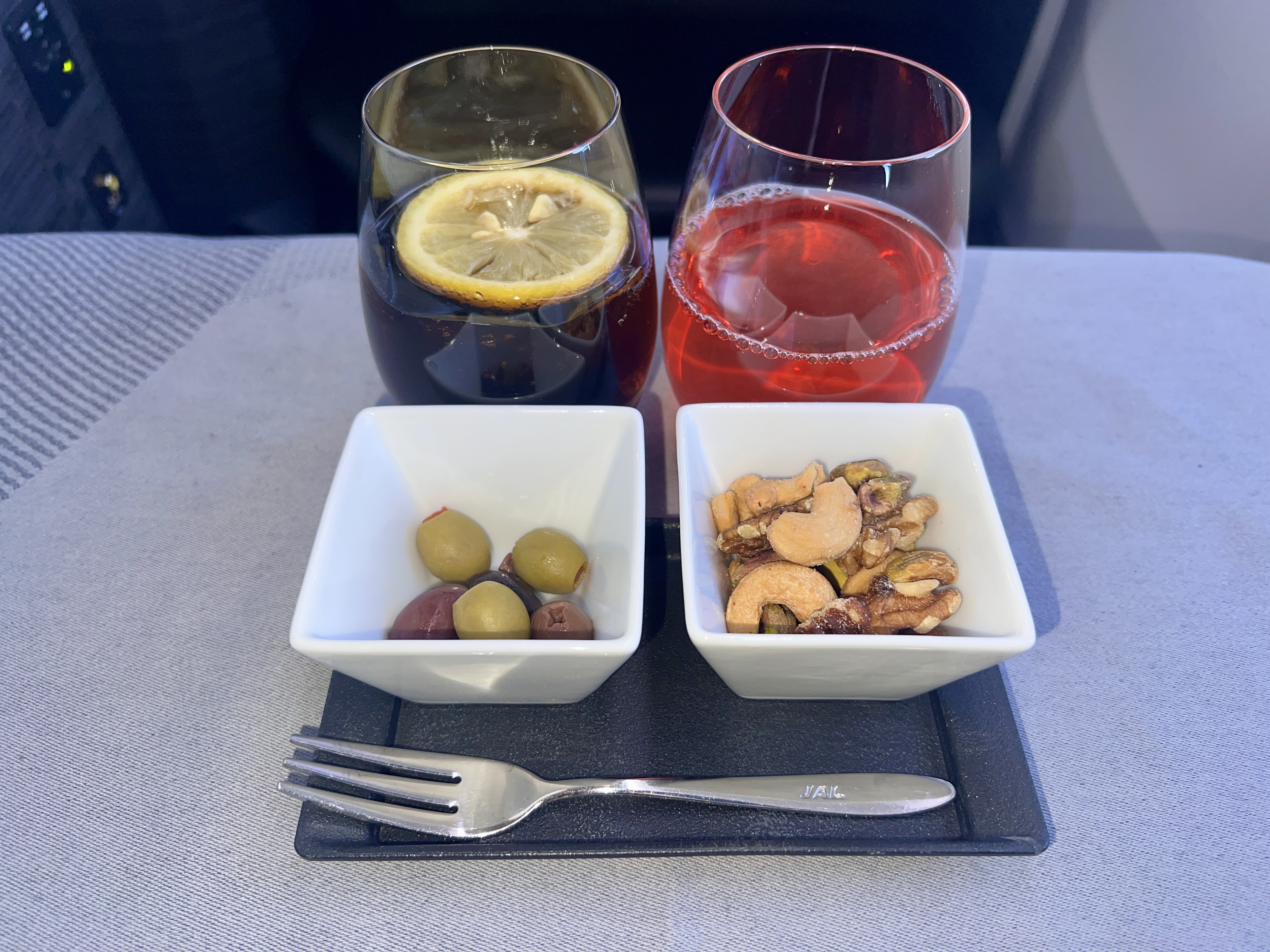 Japan Airlines 777 300er business class welcome snacks and drinks Japan Airlines 777 300er business class welcome snacks and drinks