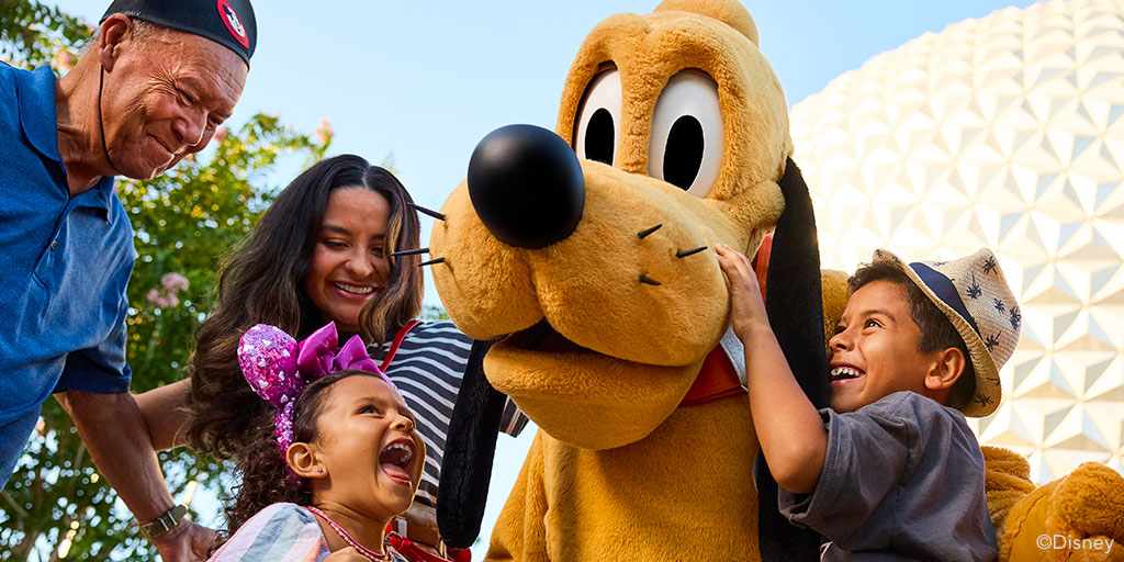 Family with Pluto at EPCOT Family with Pluto at EPCOT
