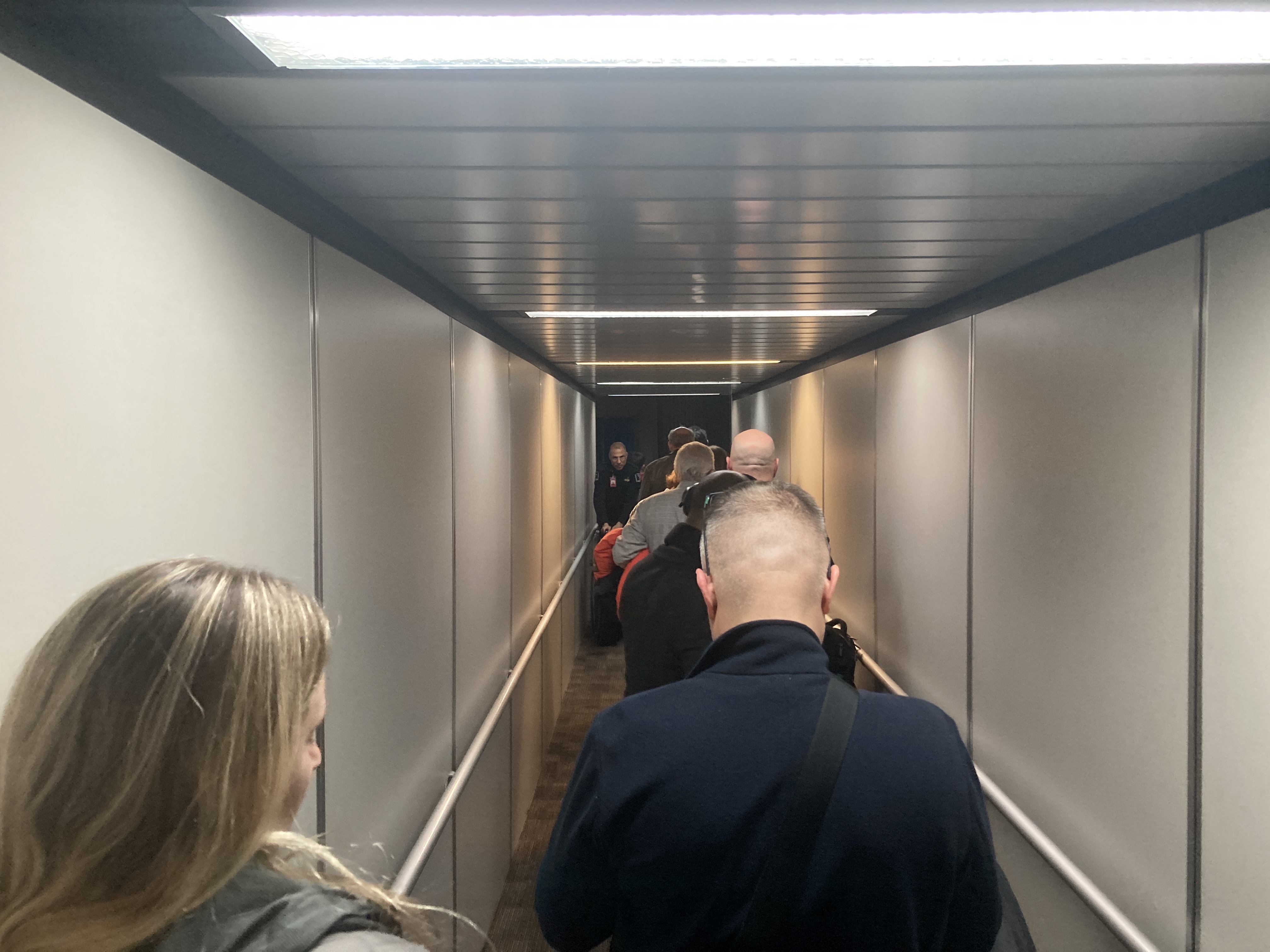 TAP Air Portugal line in jet bridge during boarding TAP Air Portugal line in jet bridge during boarding