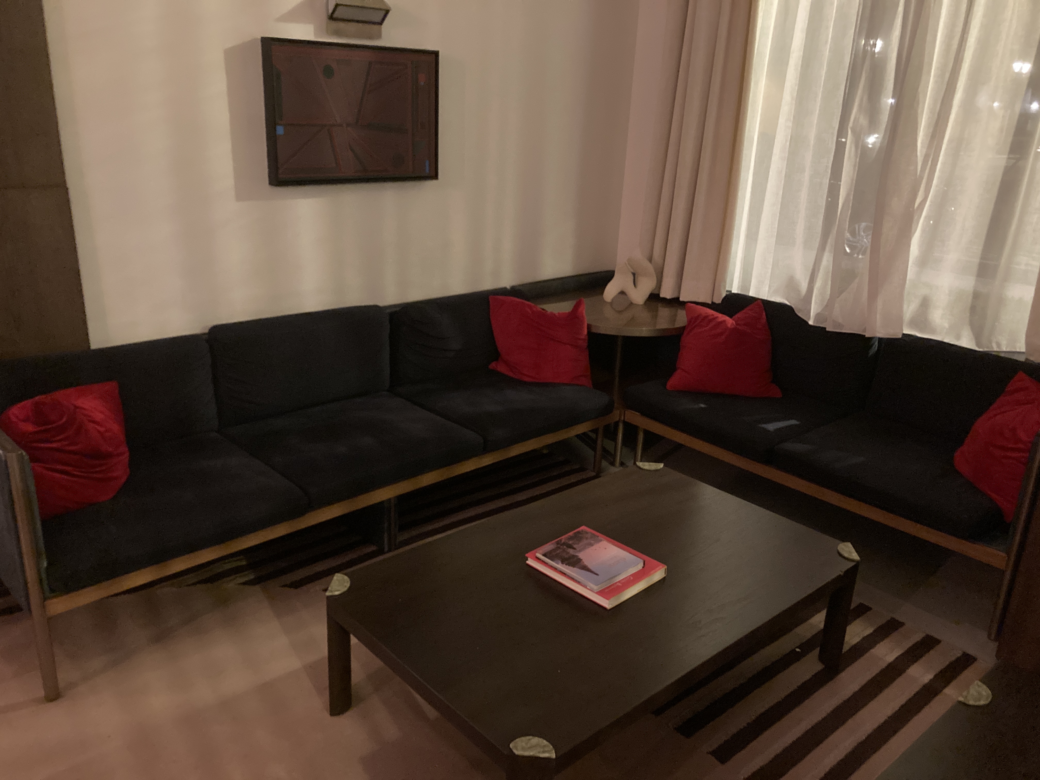 Thompson Washington DC seating area with sofas near lobby bar