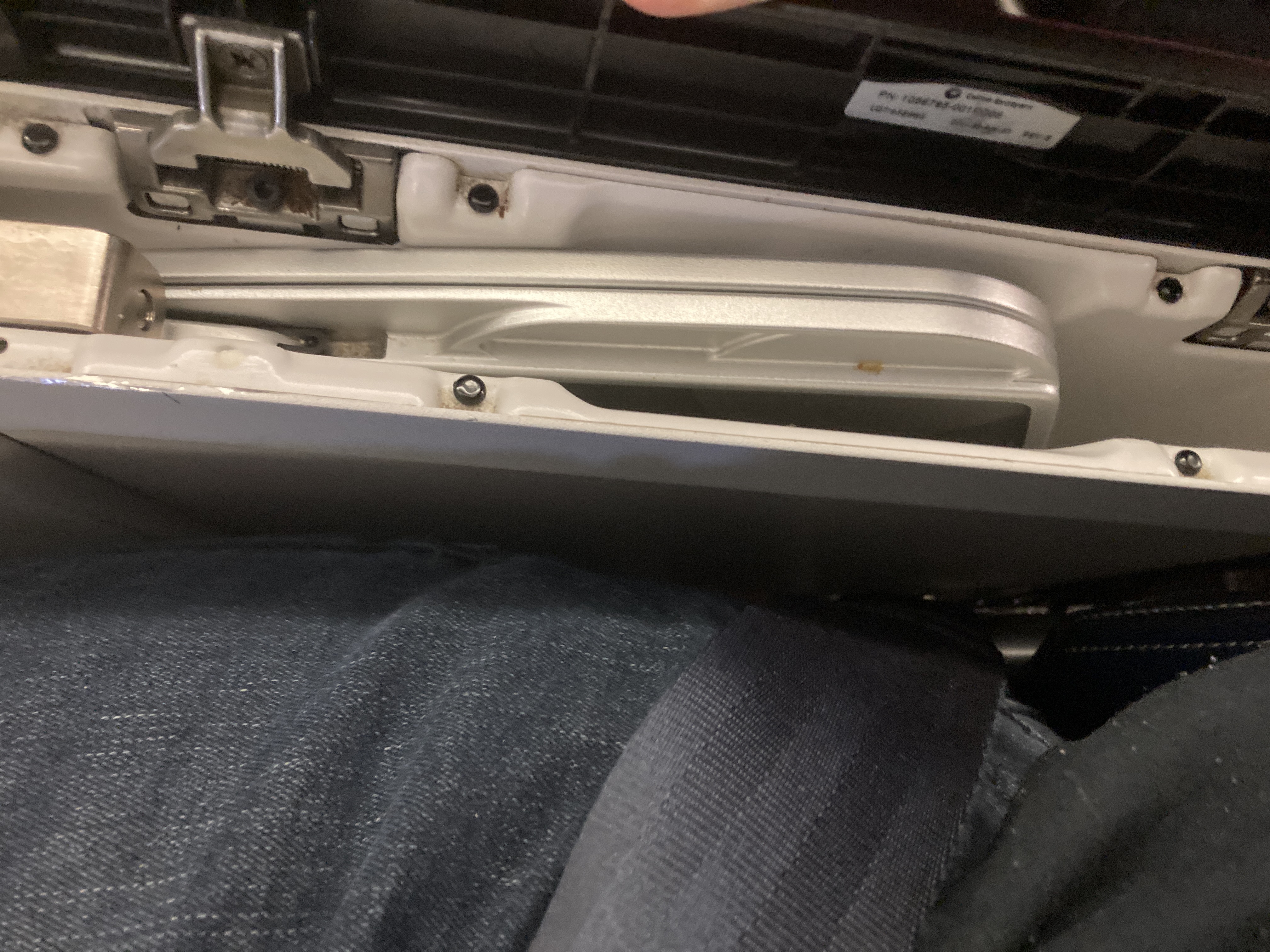 United Boeing 777 200 premium economy bulkhead seat tray table in arm rest United Boeing 777 200 premium economy bulkhead seat tray table in arm rest