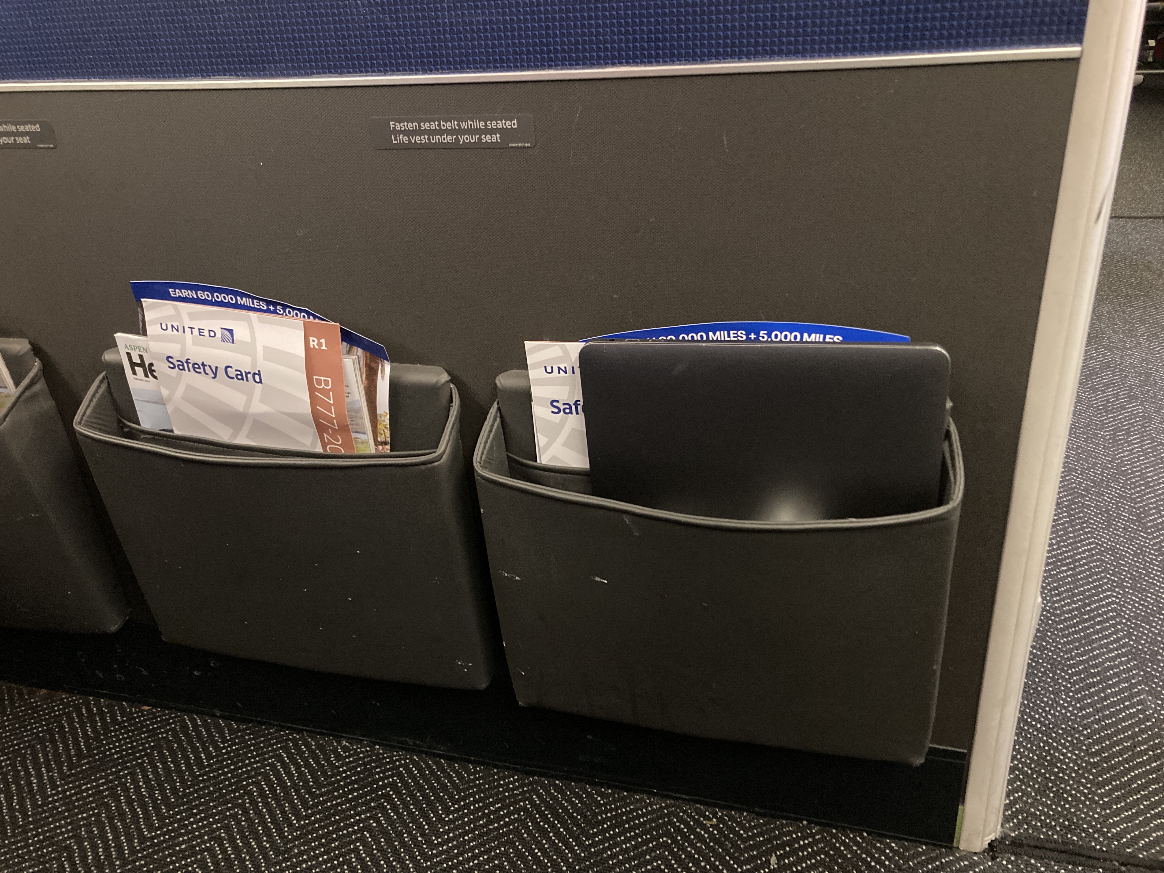 United Boeing 777 200 storage pocket on bulk head row 41 United Boeing 777 200 storage pocket on bulk head row 41