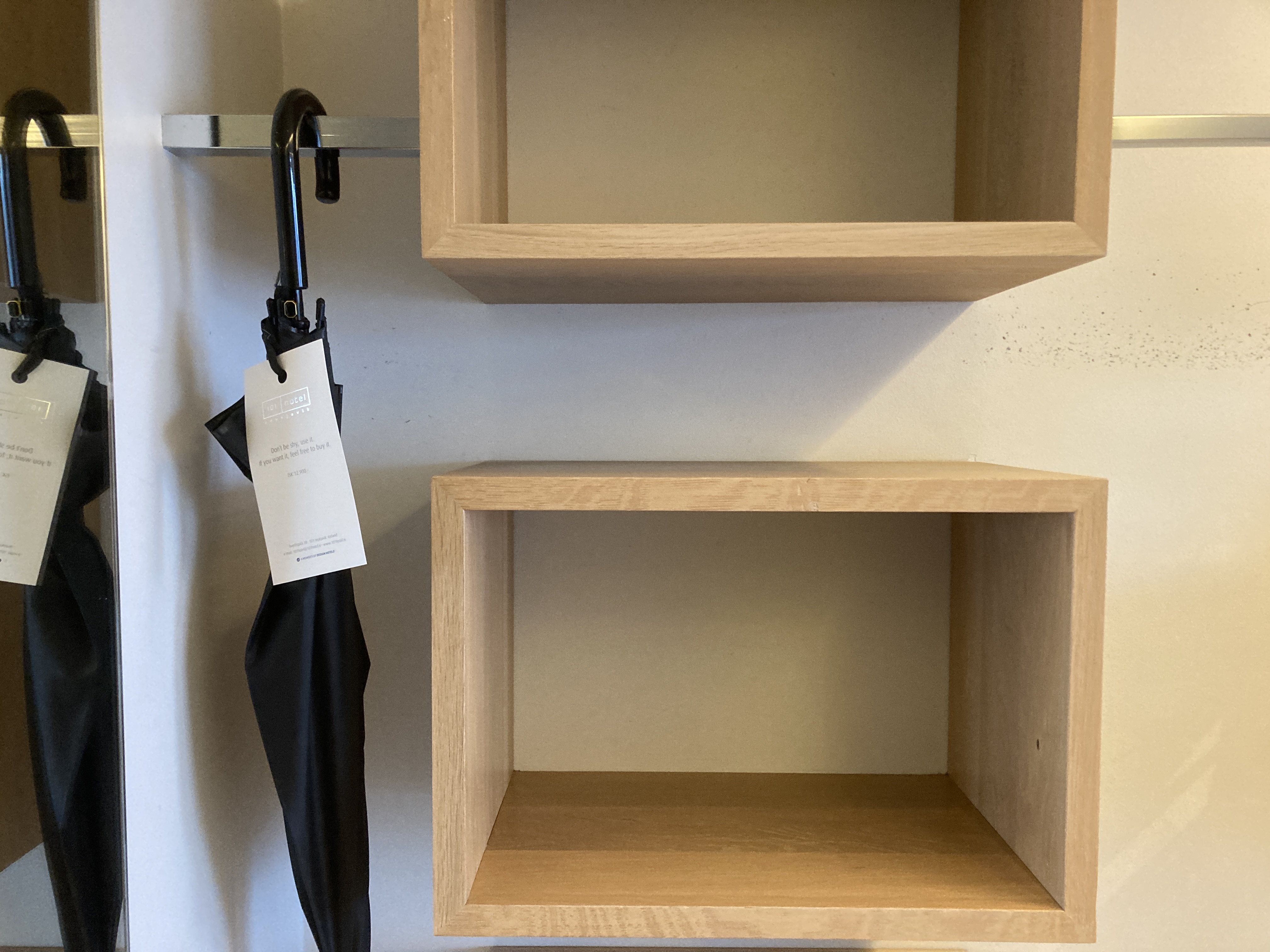 101 Hotel Reykjavik closet shelves and umbrella