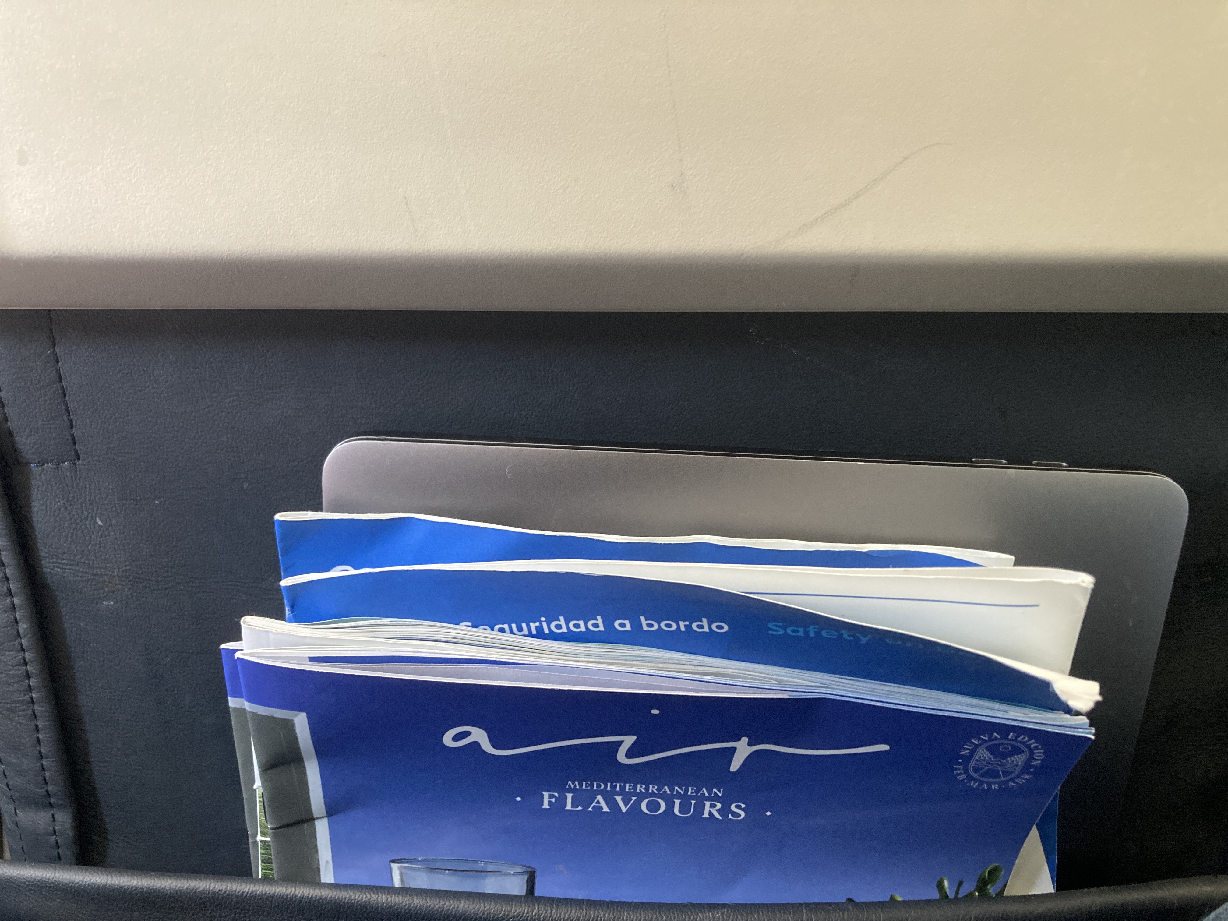 Air Europa laptop and documents in seat back pocket Air Europa laptop and documents in seat back pocket