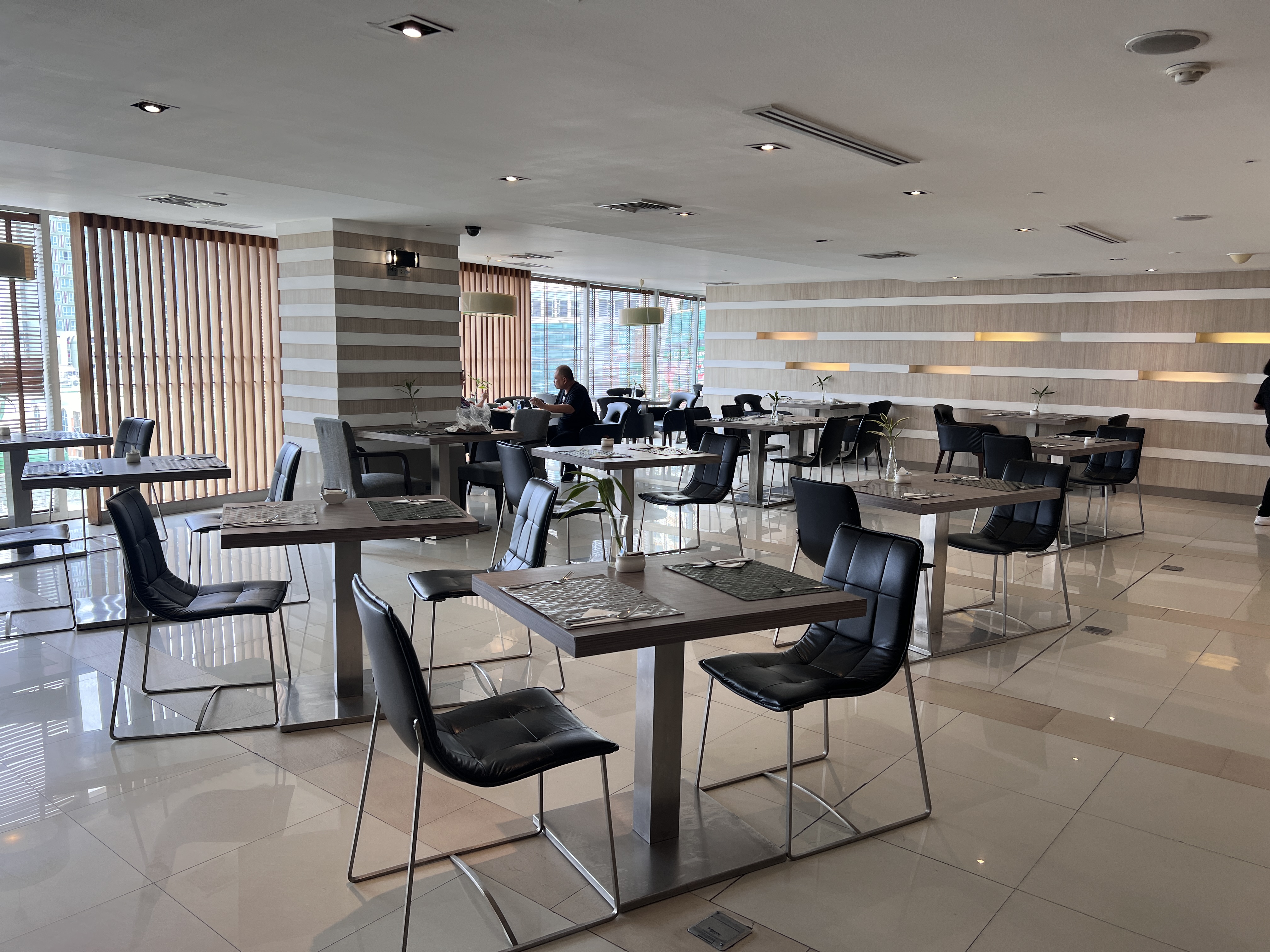 Hilton Garden Inn Bangkok Silom All Day Dining table seating