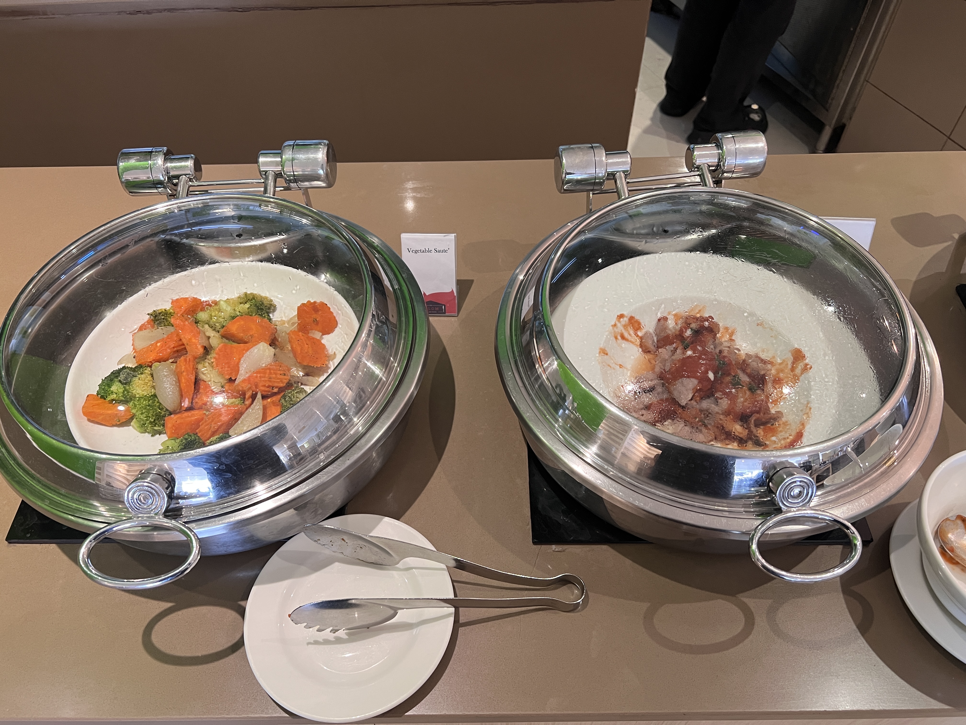 Hilton Garden Inn Bangkok Silom All Day Dining vegetable sautee and grilled pork