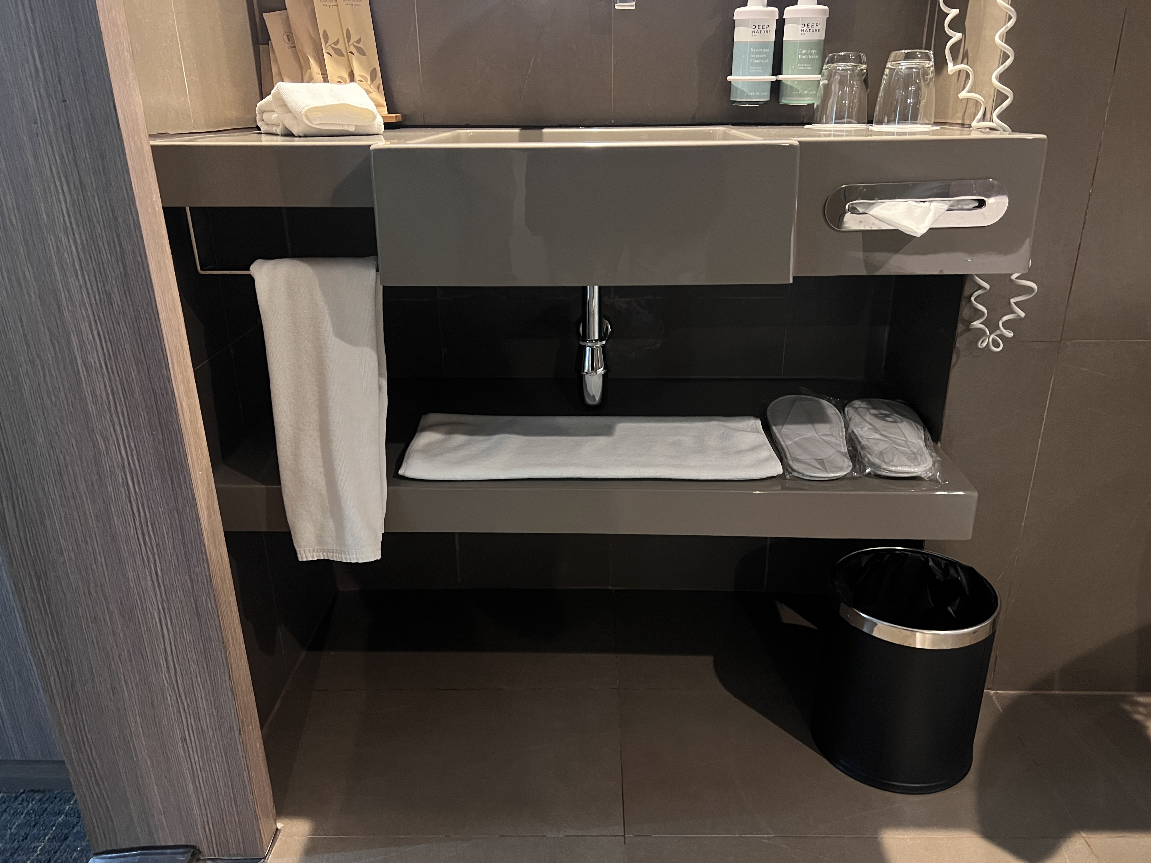 Hilton Garden Inn Bangkok Silom bathroom below vanity