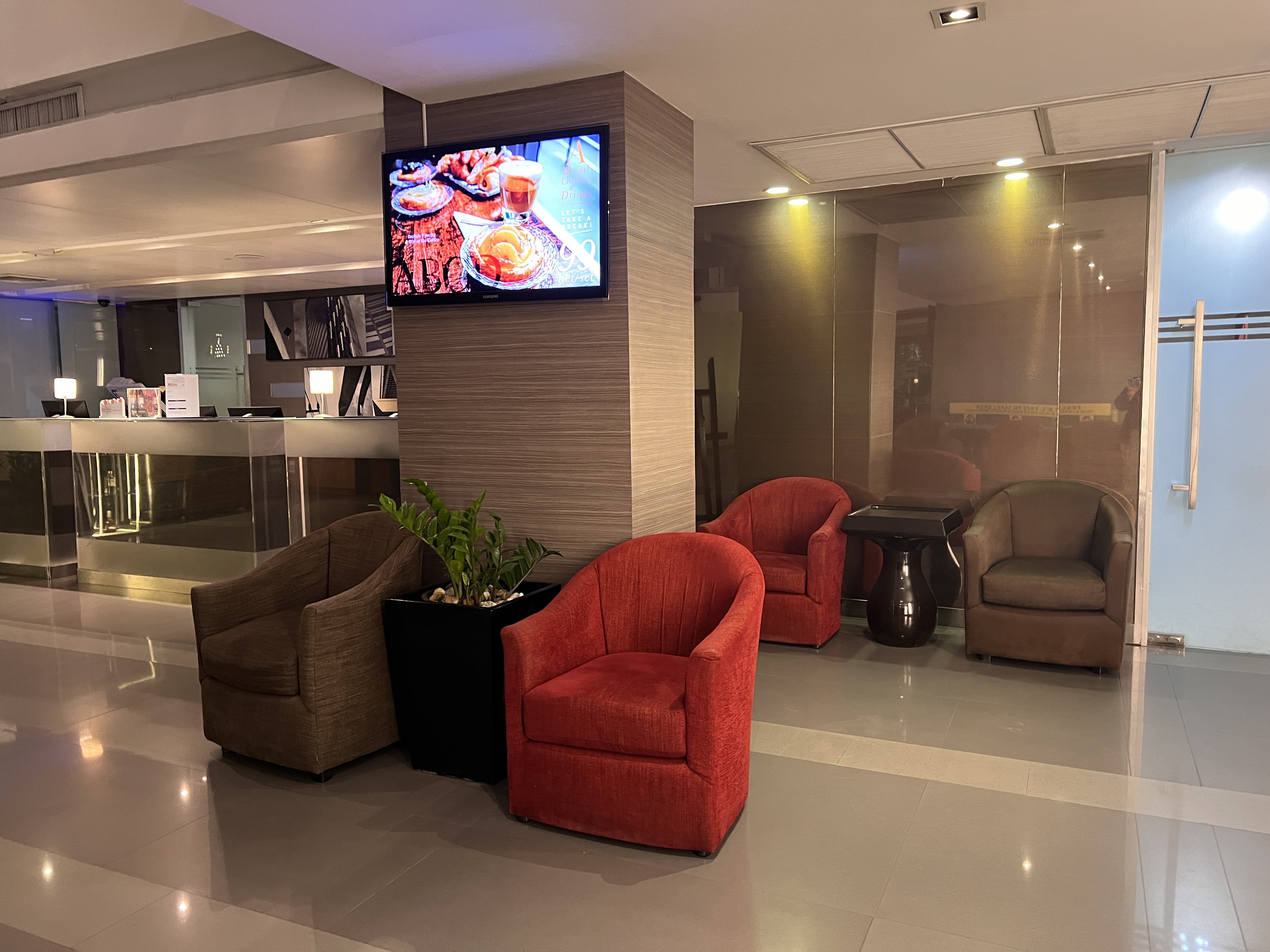 Hilton Garden Inn Bangkok Silom seating area near check in desk