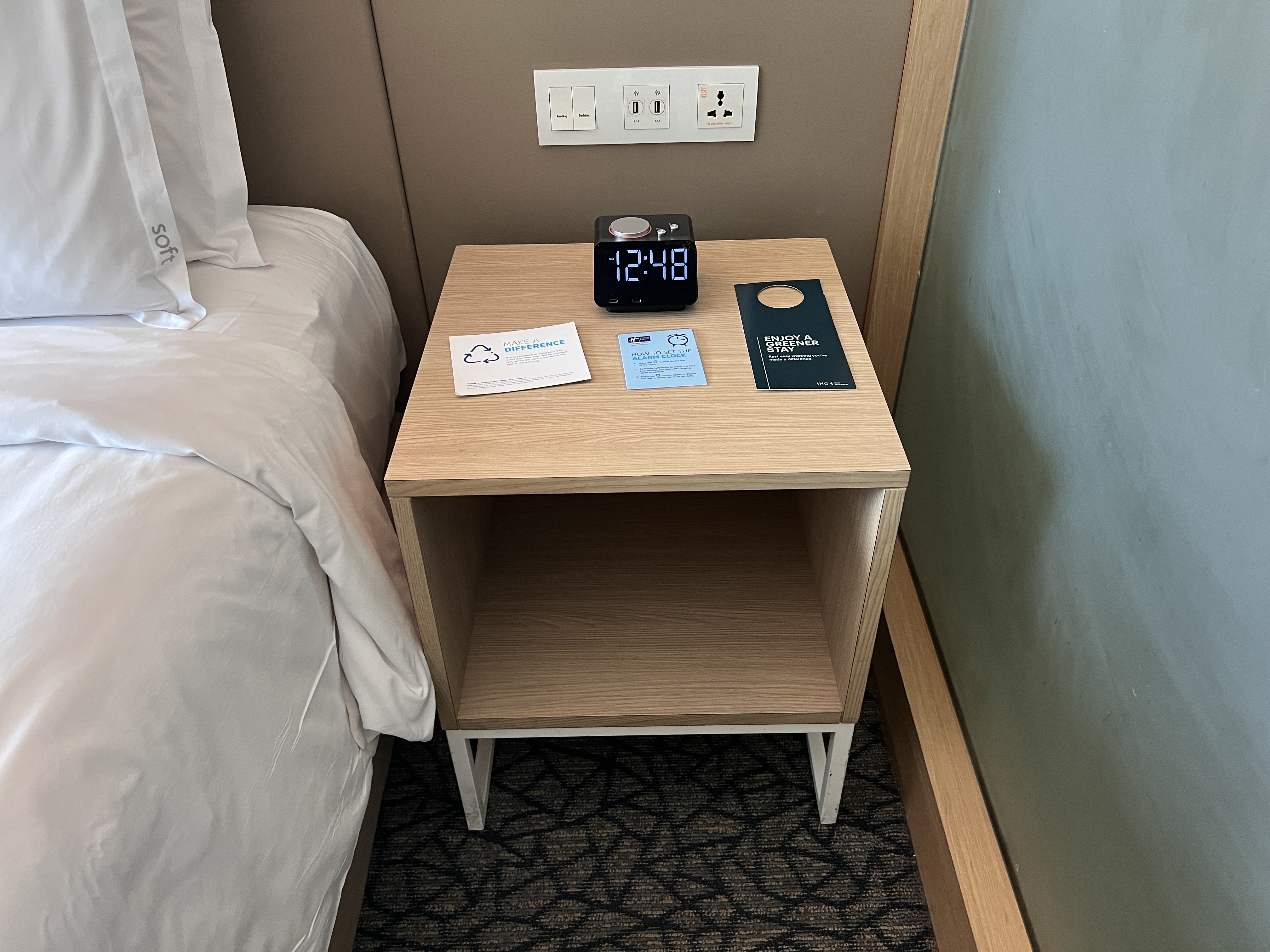 Holiday Inn Express Manila Newport City nightstand with alarm clock