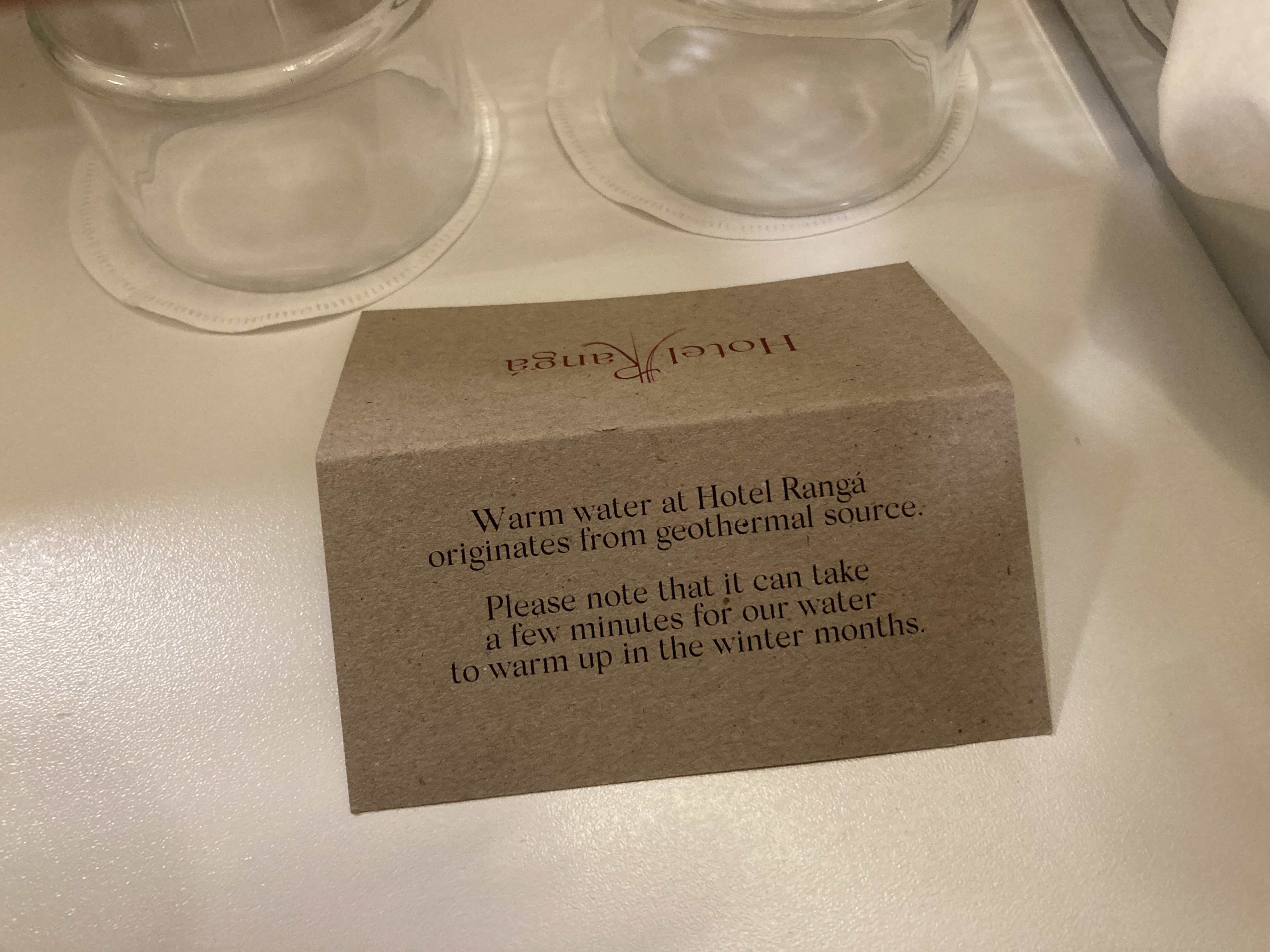 Hotel Ranga bathroom hot water sign