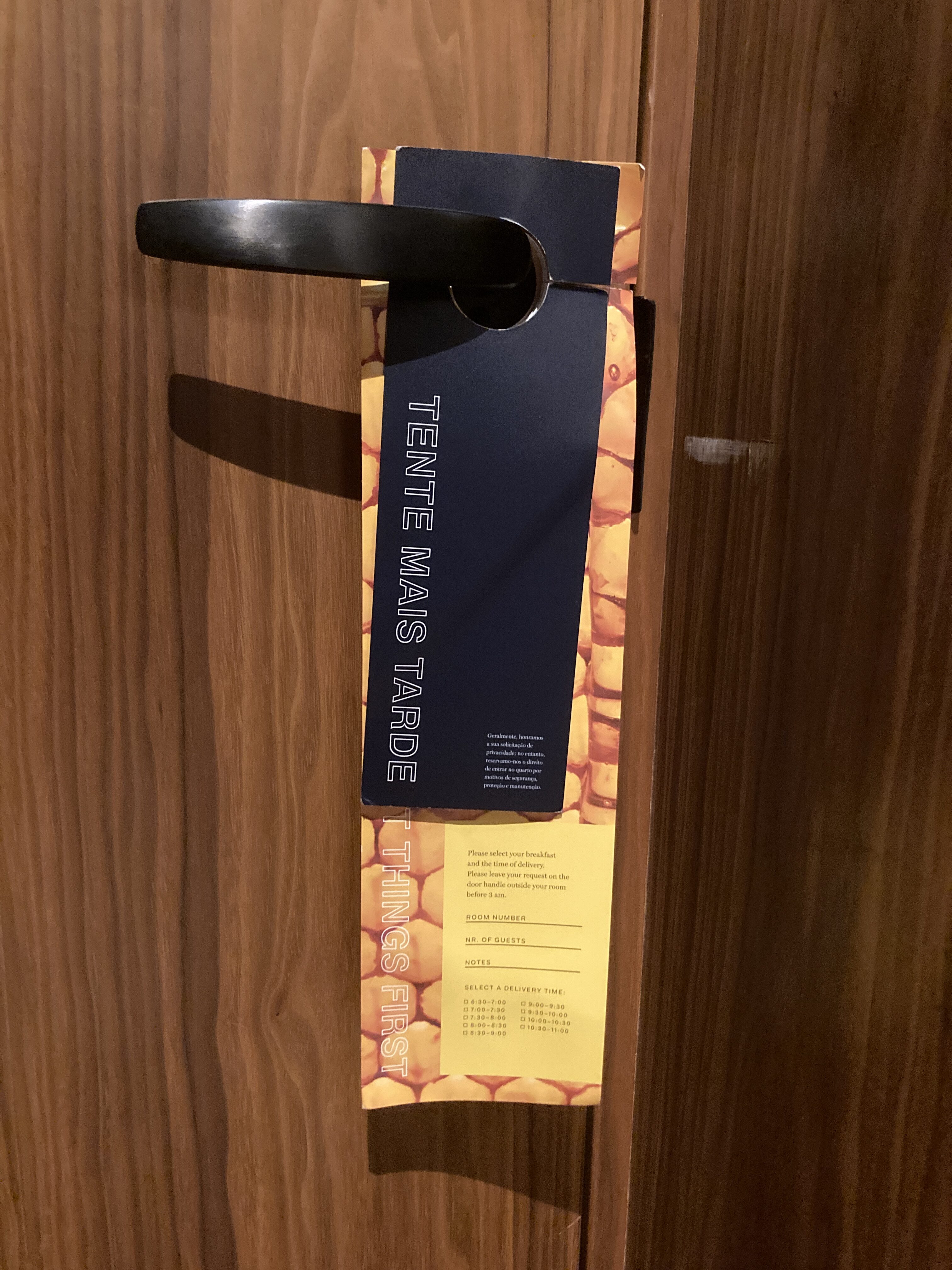 Renaissance Porto Lapa Hotel room service menu on door