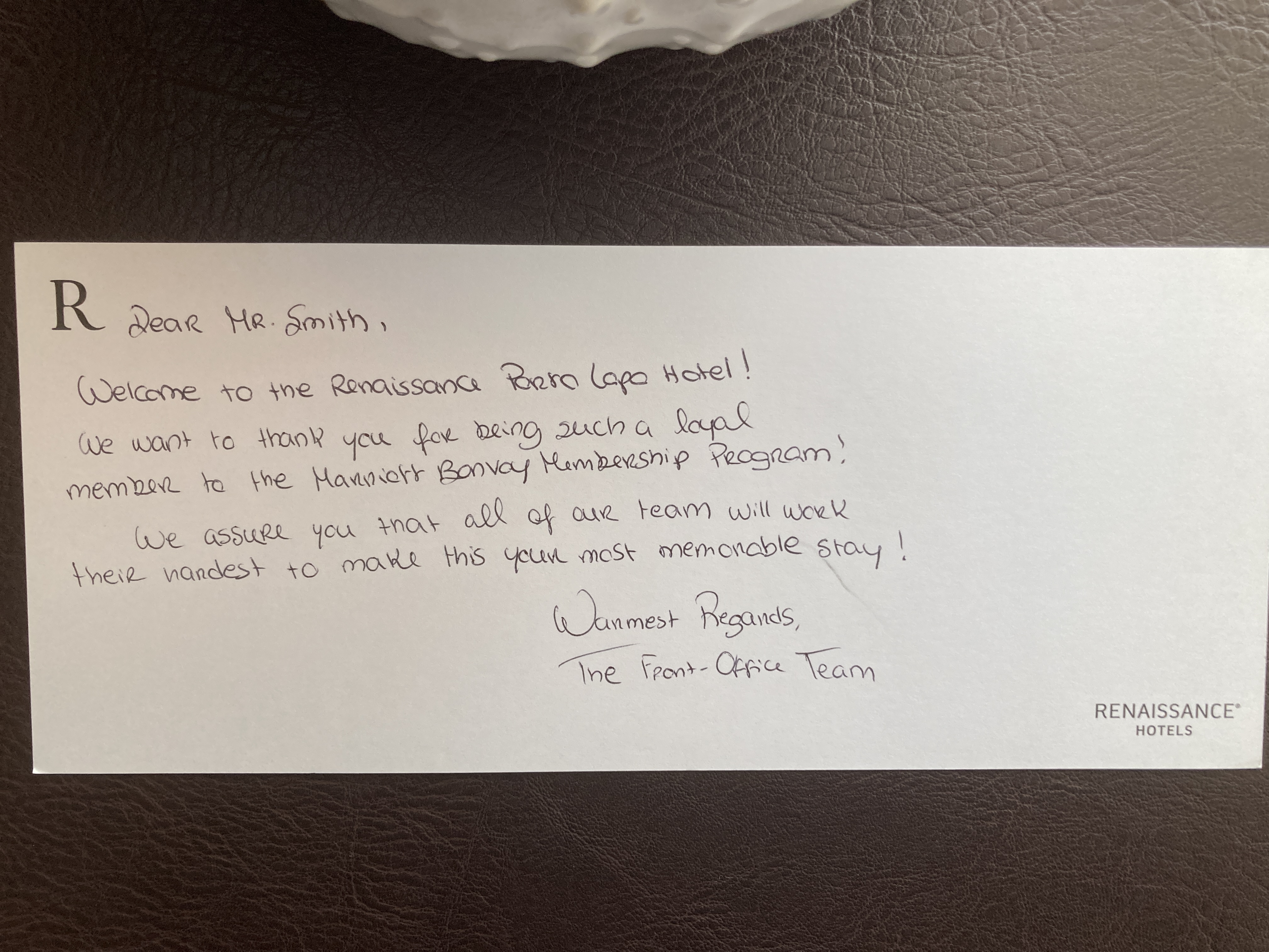 Renaissance Porto Lapa Hotel suite living room note on desk