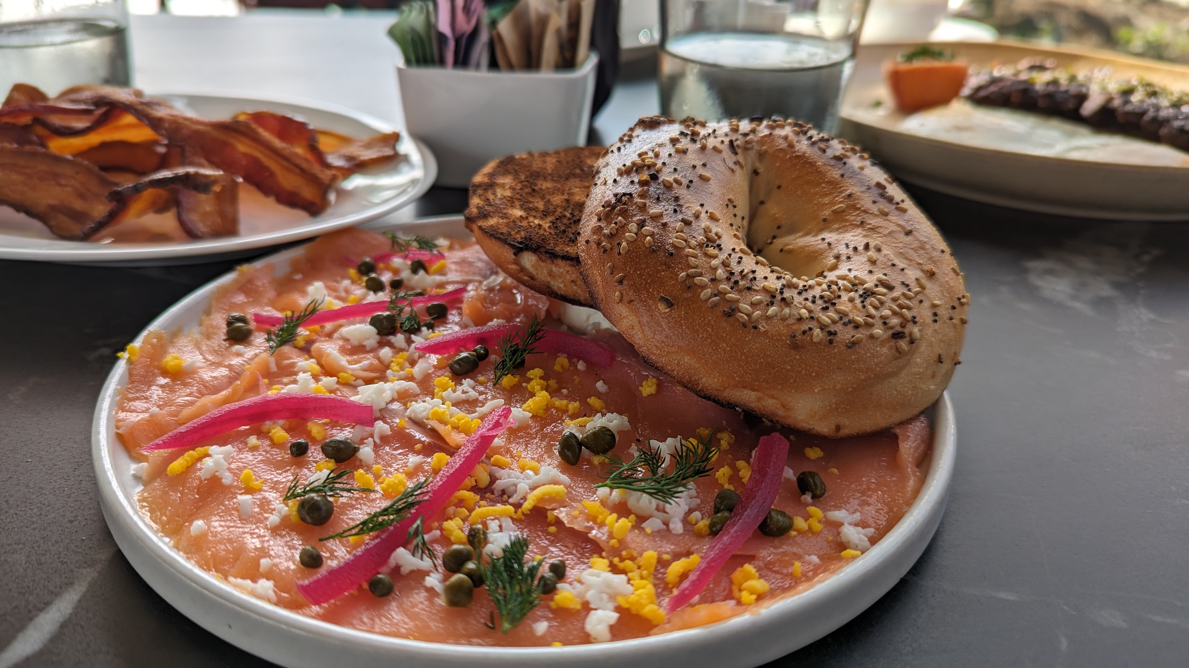 Thompson Houston Sol7 breakfast bagel and lox with bacon Thompson Houston Sol7 breakfast bagel and lox with bacon