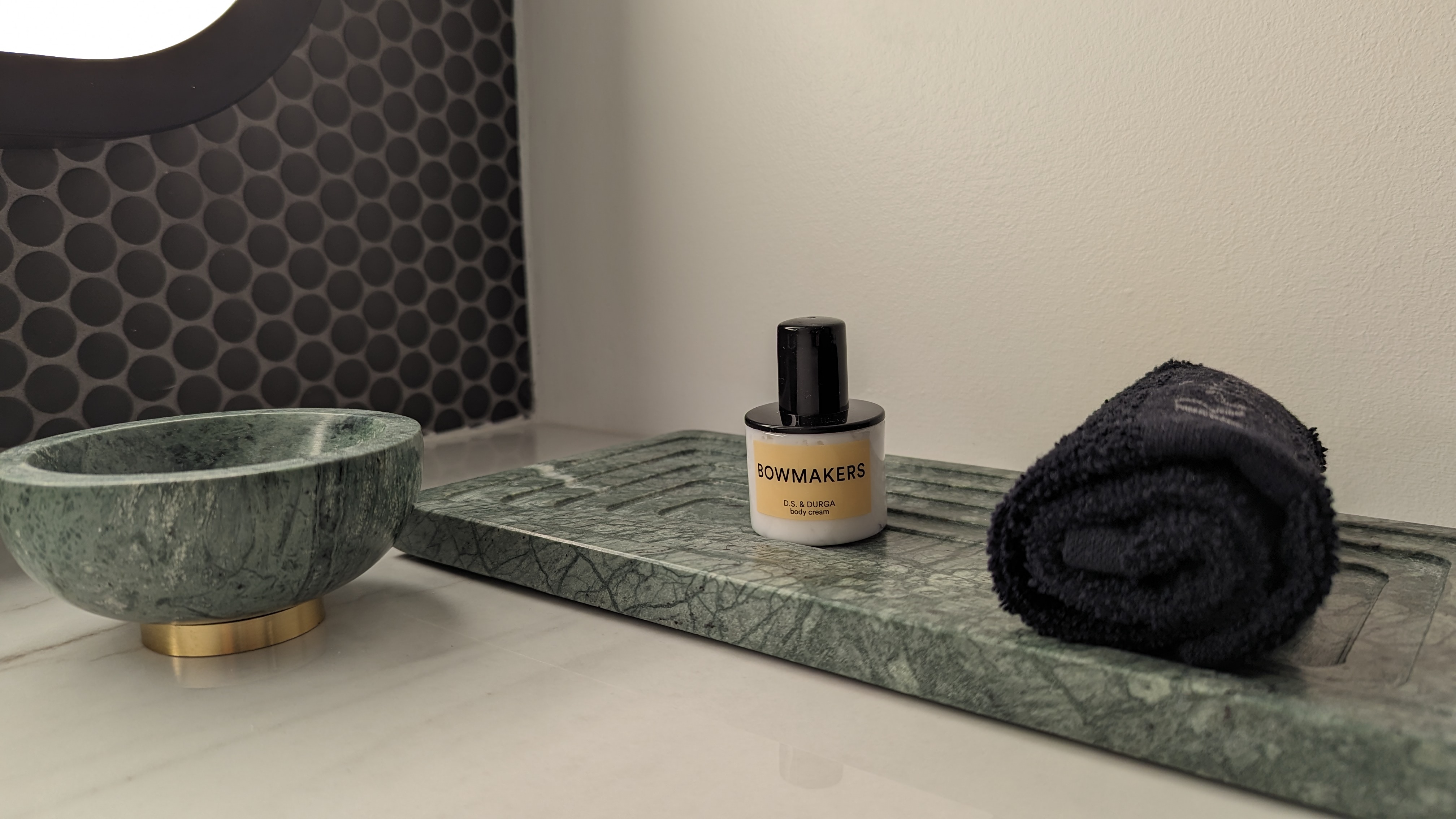Thompson Houston guestroom bathroom mirror amenities Thompson Houston guestroom bathroom mirror amenities