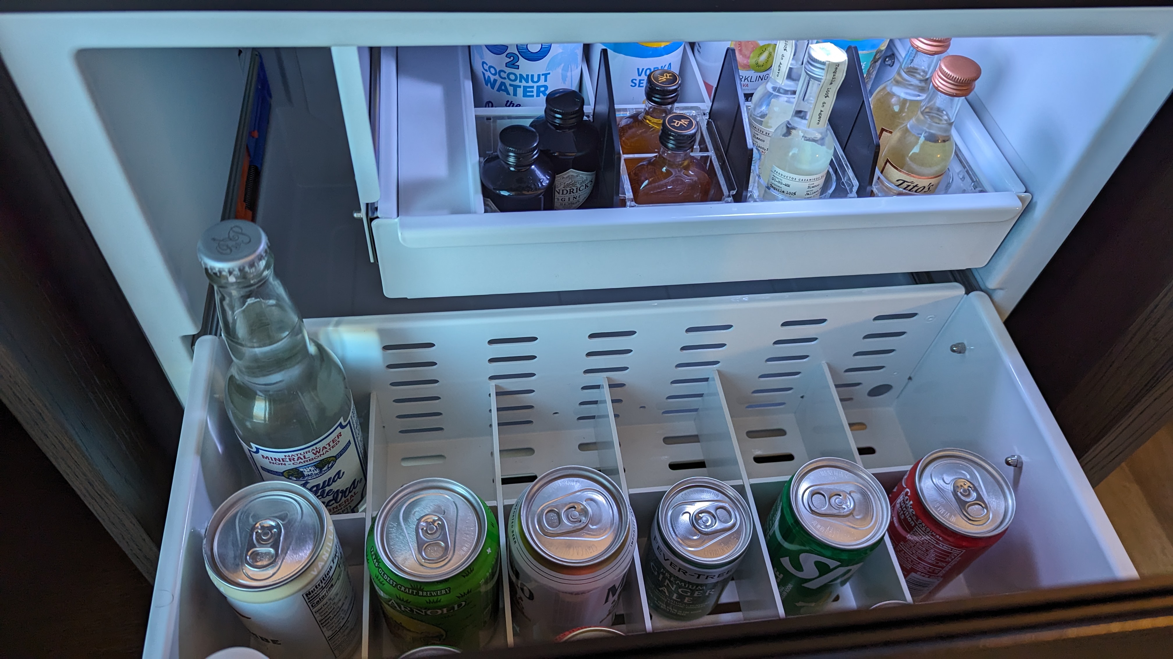 Thompson Houston guestroom bedroom minibar drinks with alcohol Thompson Houston guestroom bedroom minibar drinks with alcohol
