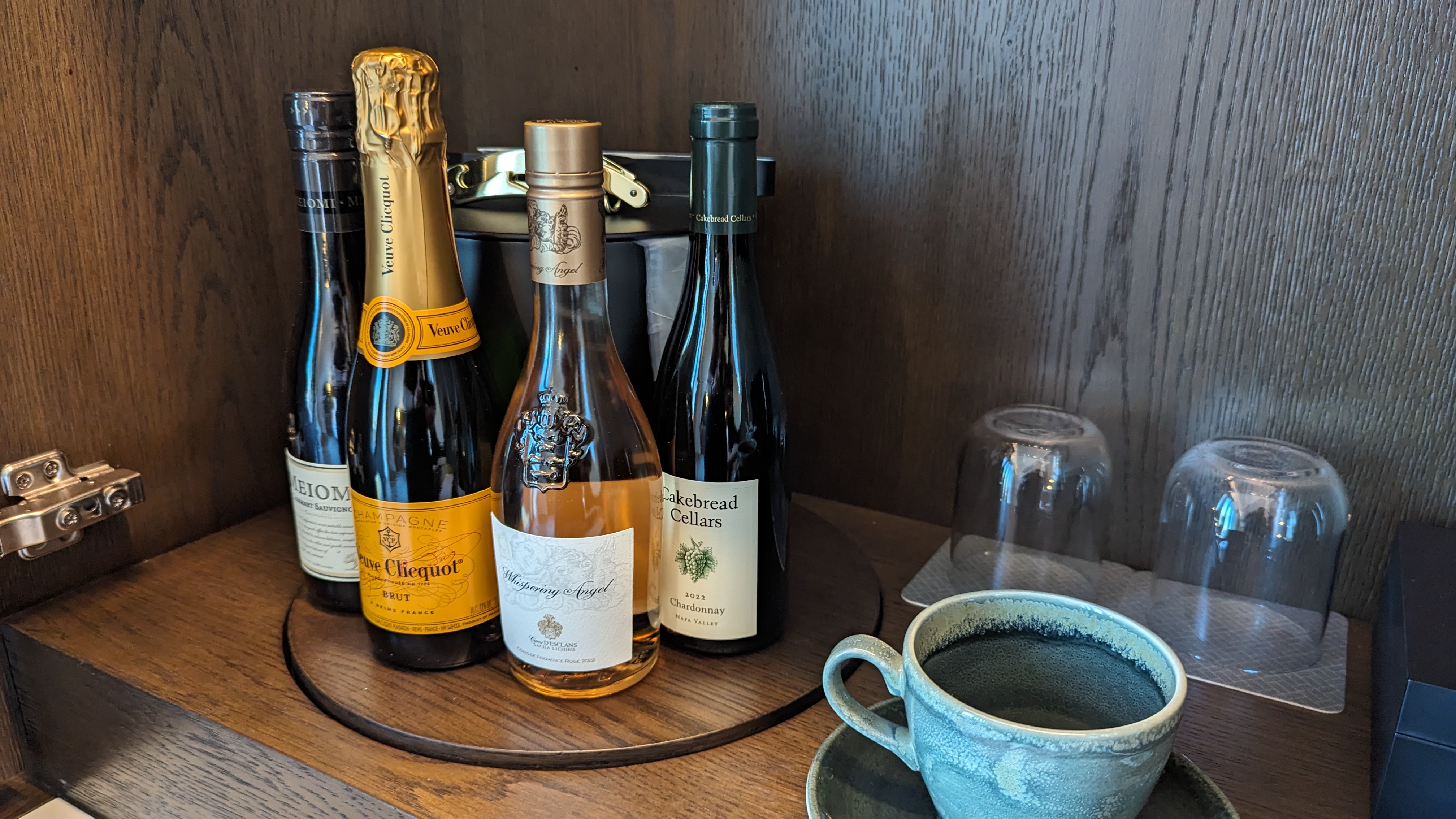 Thompson Houston guestroom bedroom minibar wines Thompson Houston guestroom bedroom minibar wines