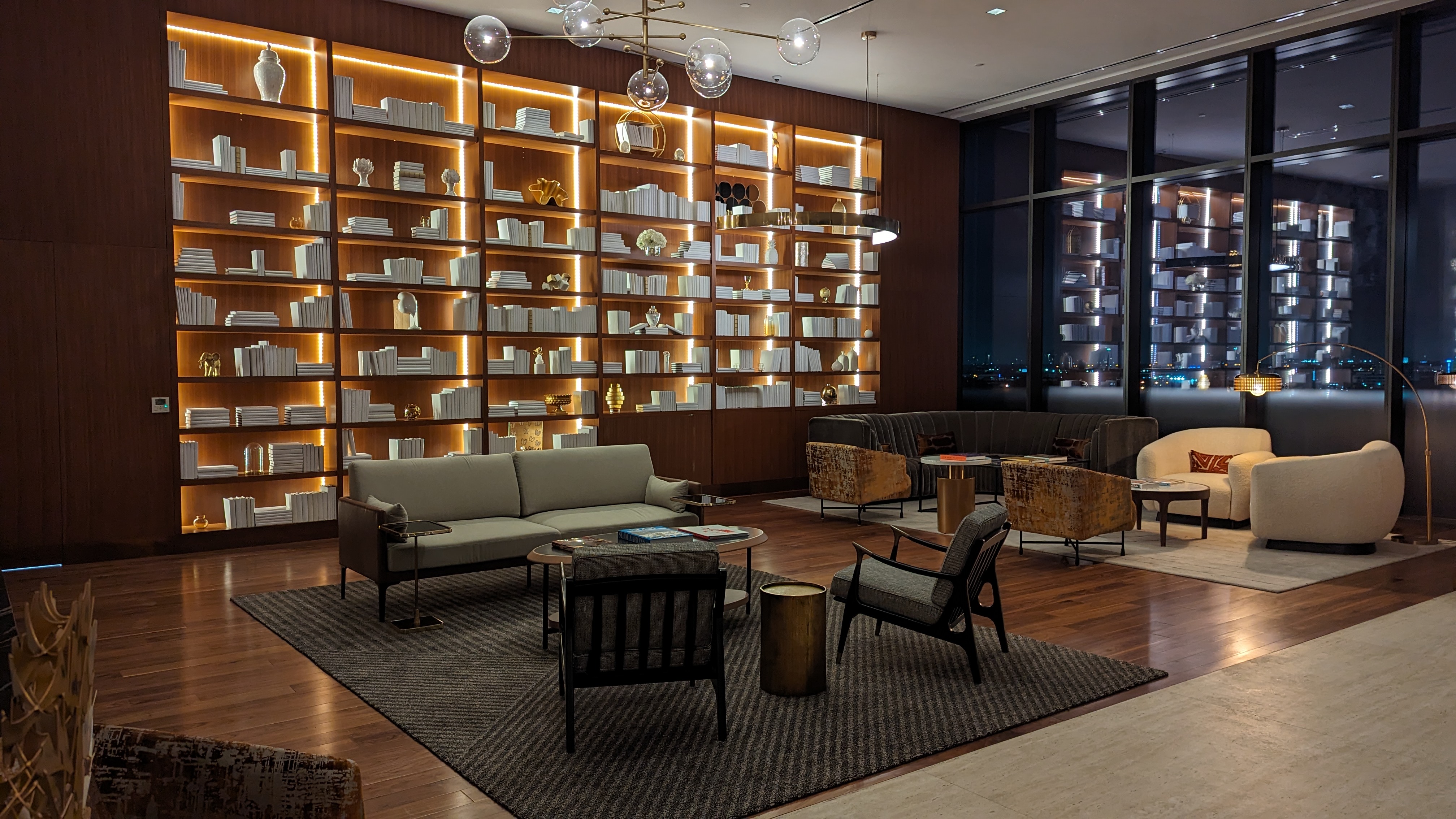 Thompson Houston lobby reading room night Thompson Houston lobby reading room night