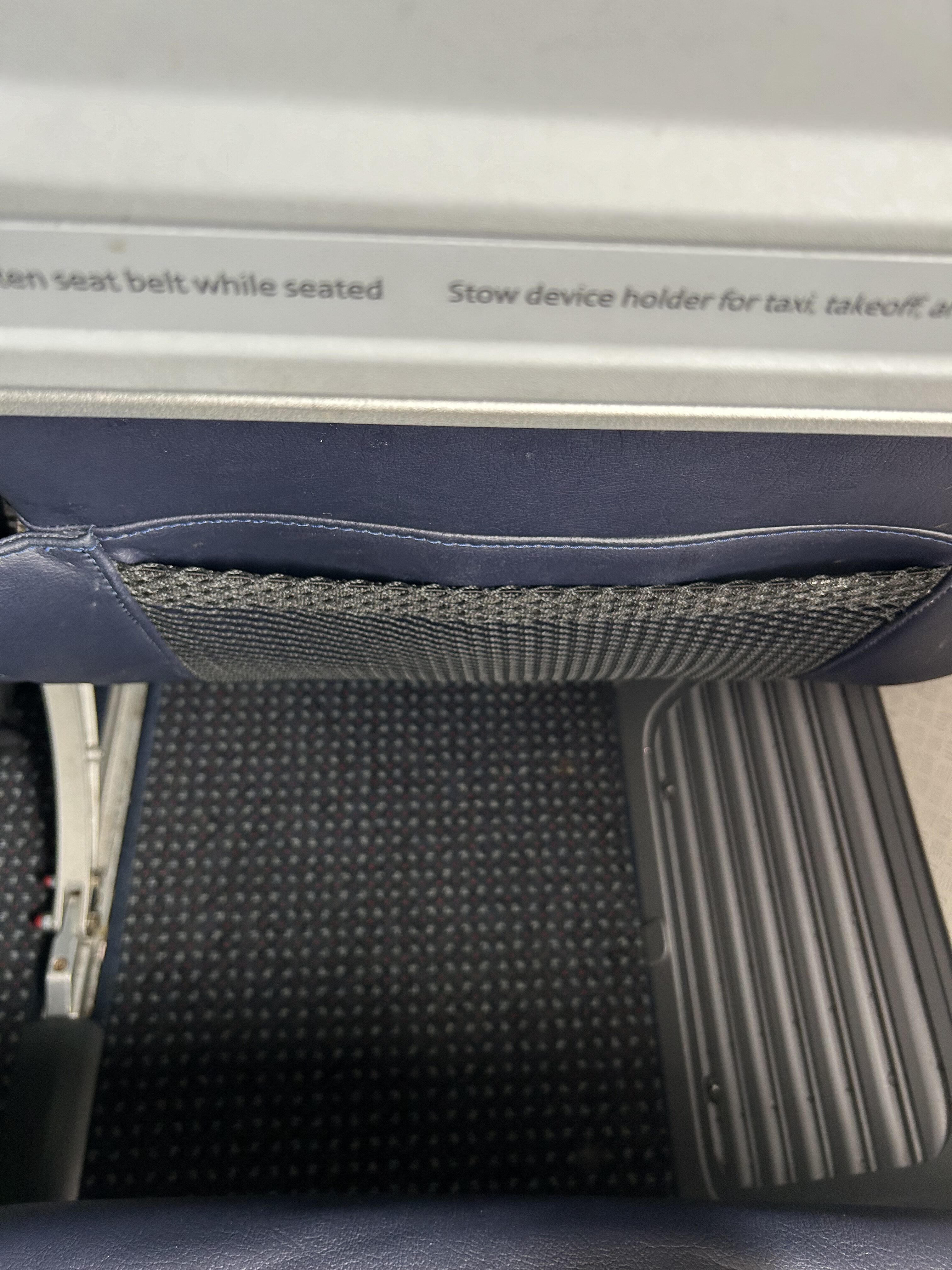 AA 738 LGA DFW 11F footwell