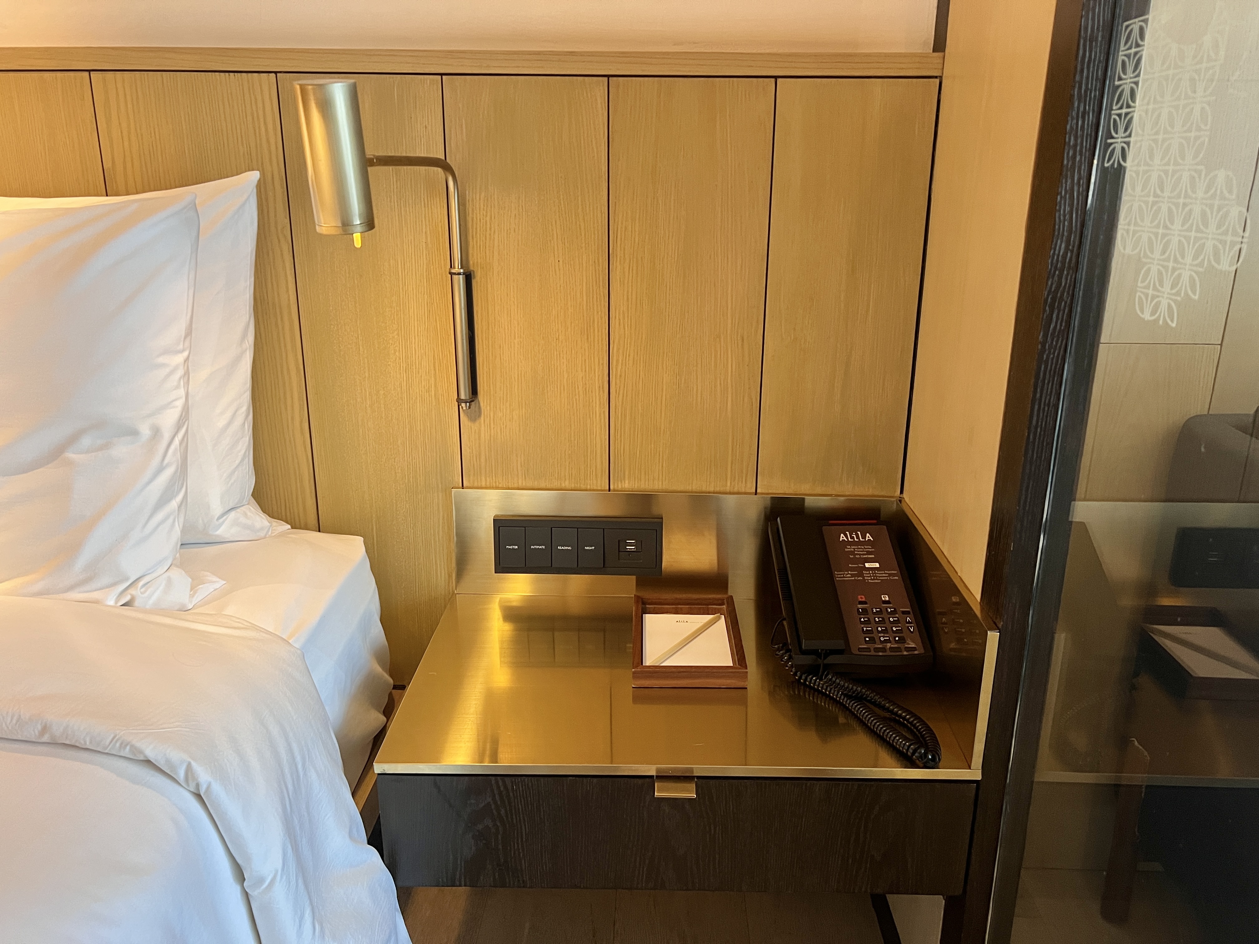 Alila Bangsar Kuala Lumpur room nightstand with room phone Alila Bangsar Kuala Lumpur room nightstand with room phone