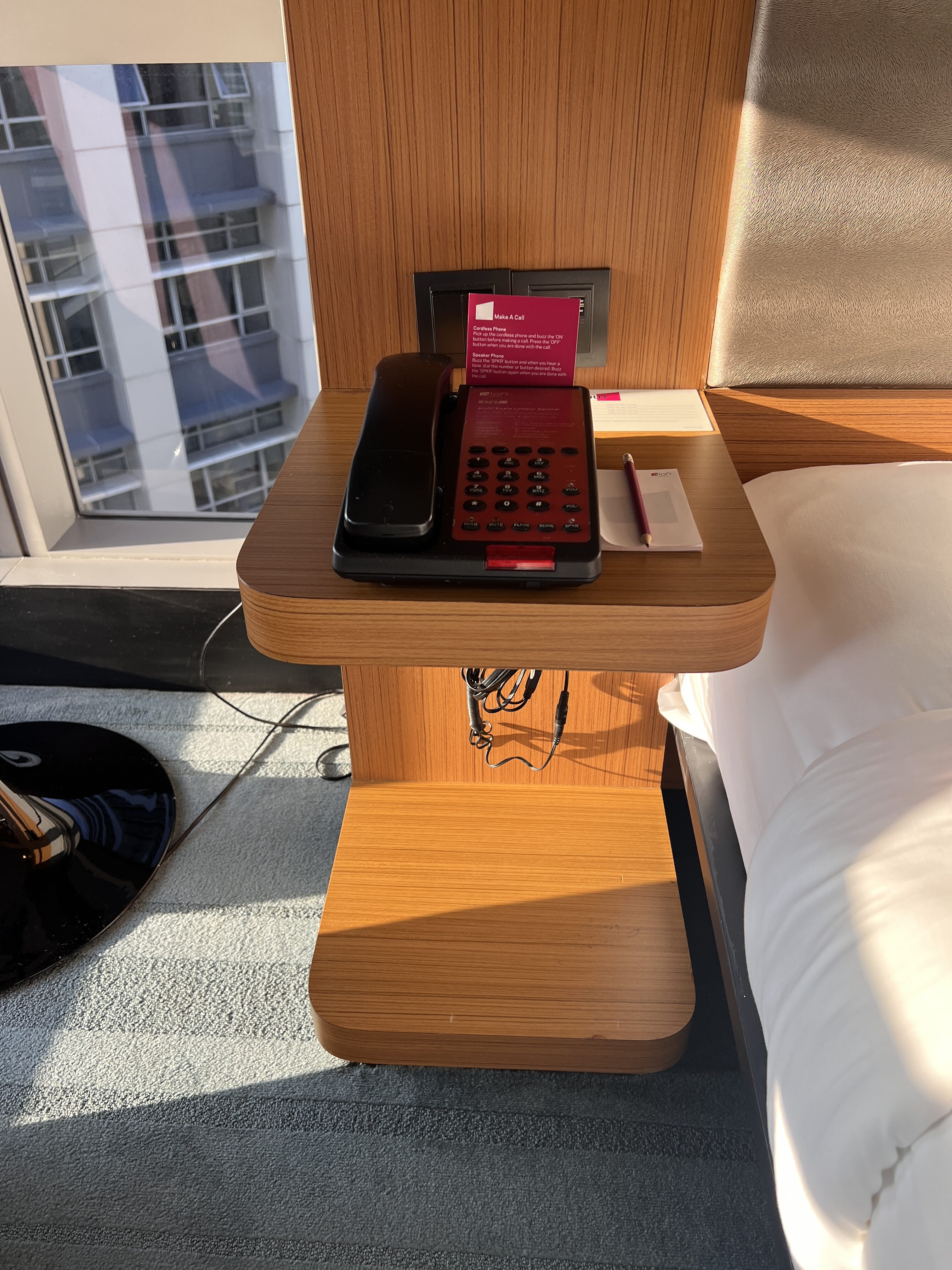 Aloft Kuala Lumpur Sentral bedroom with room phone Aloft Kuala Lumpur Sentral bedroom with room phone