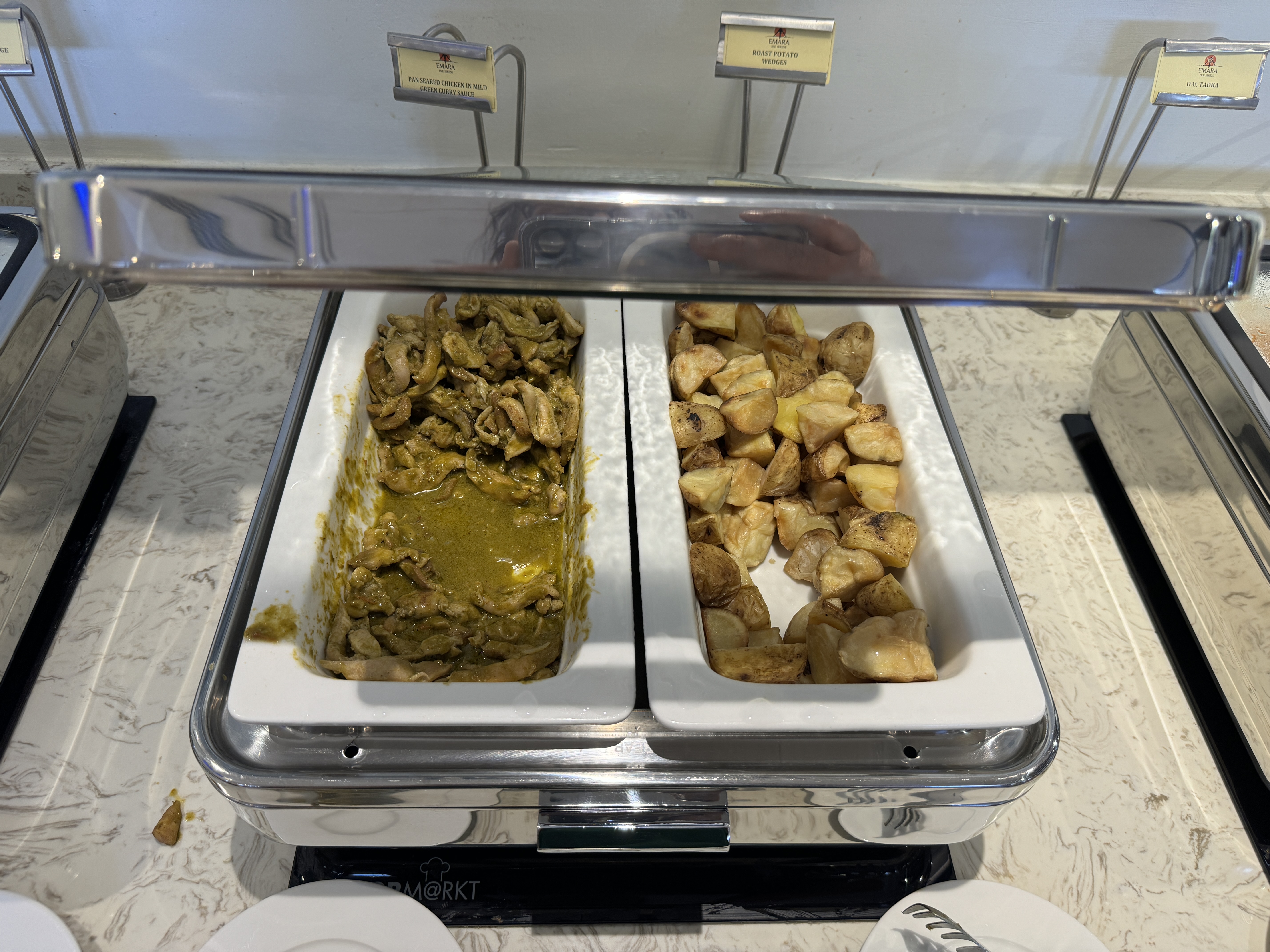 Aspire Lounge NBO curry chicken potatoes