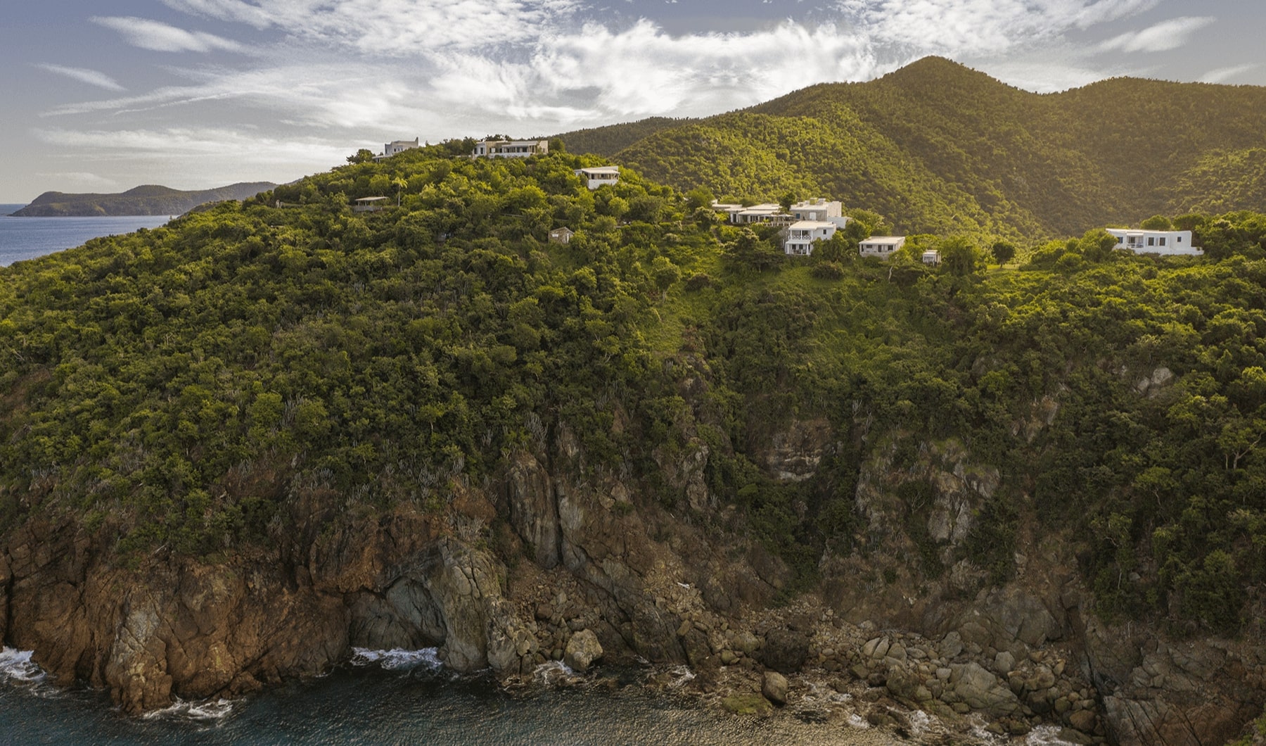 Guana Island Resort Guana Island Resort in the British Virgin Islands overlooks the water from high on the mountainside.