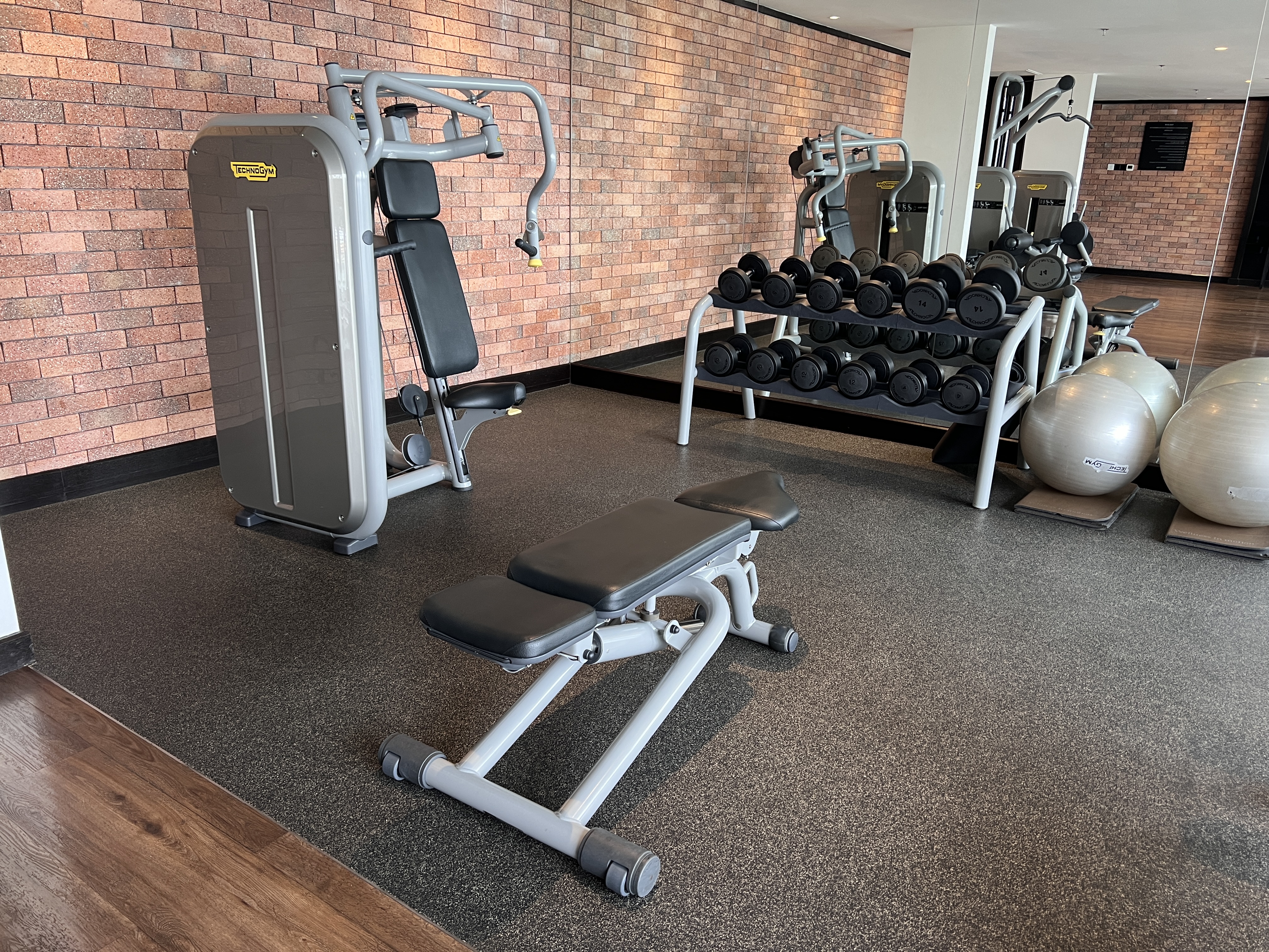 Hotel Stripes Kuala Lumpur Autograph Collection fitness center bench and weights Hotel Stripes Kuala Lumpur Autograph Collection fitness center bench and weights